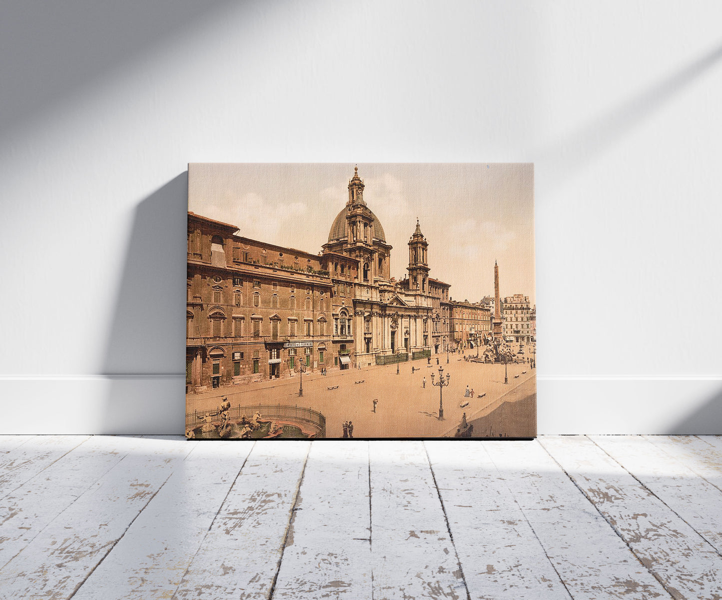 A picture of Piazza Navona, Rome, Italy, a mockup of the print leaning against a wall