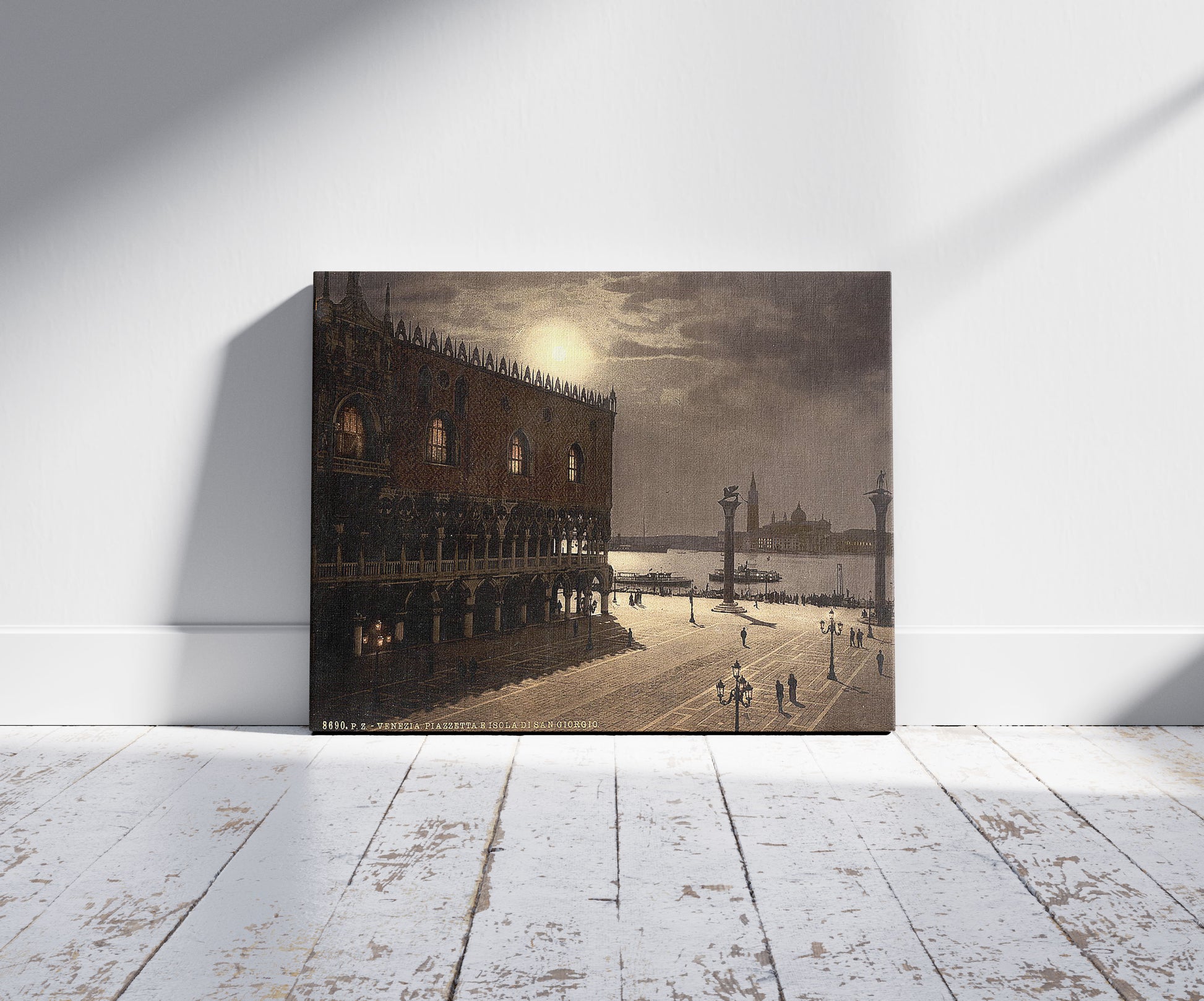 A picture of Piazzetta and San Georgio by moonlight, Venice, Italy, a mockup of the print leaning against a wall