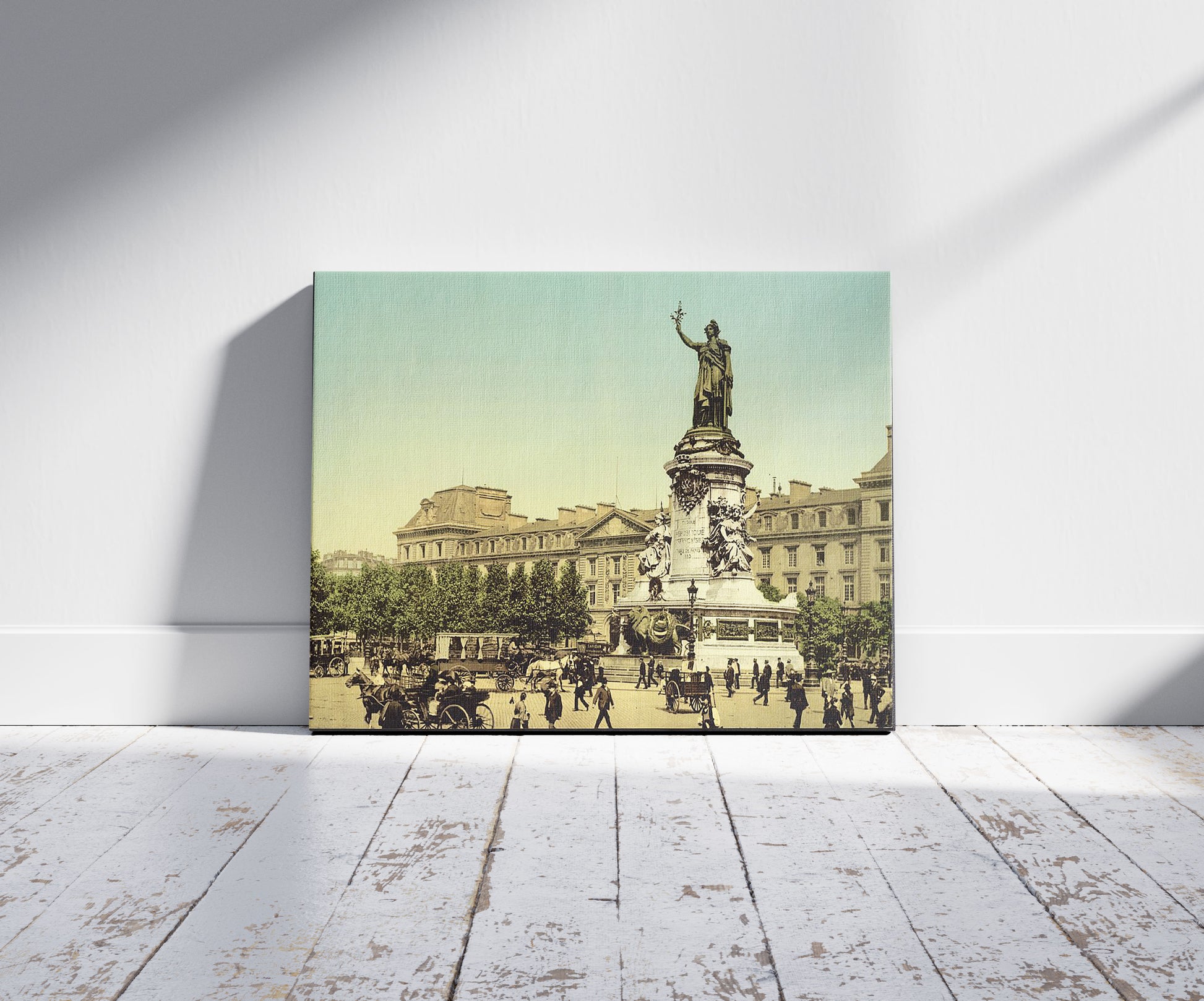 A picture of Place de la Republique, Paris, France, a mockup of the print leaning against a wall