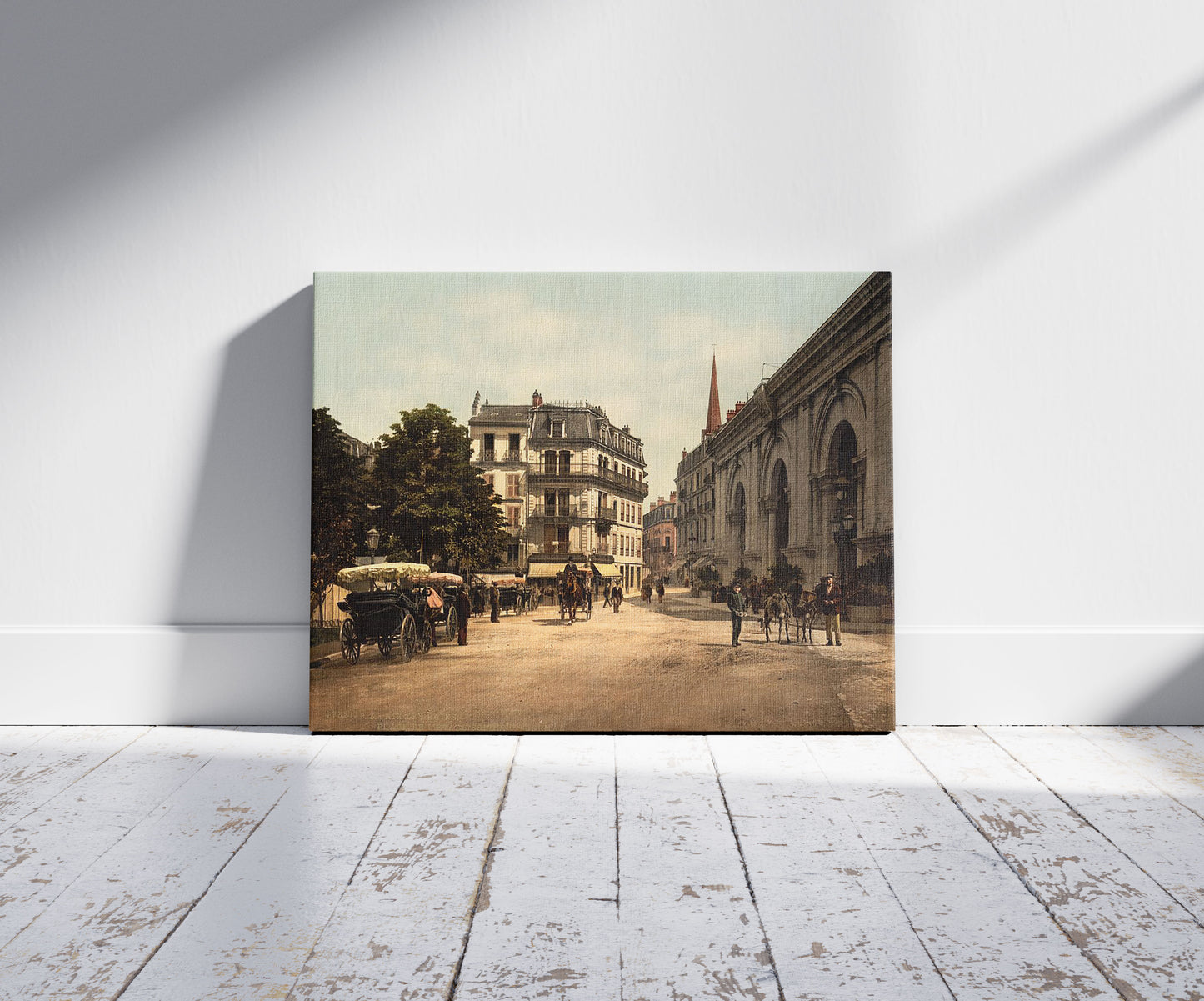 A picture of Place de l'etablissement thermal, Aix, France, a mockup of the print leaning against a wall