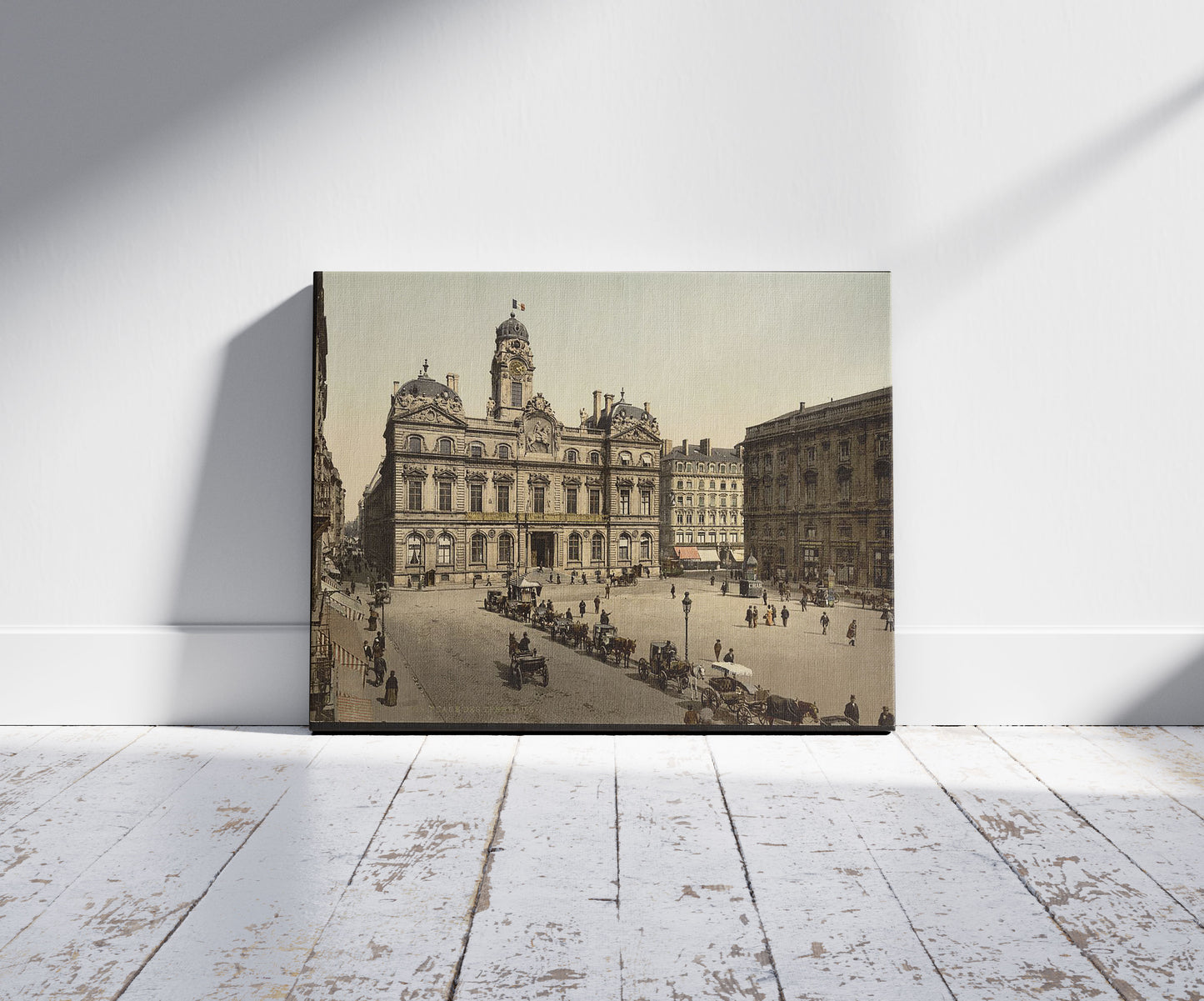 A picture of Place de Terreaux, Lyons, France, a mockup of the print leaning against a wall