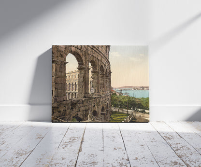 A picture of Pola, the arena, with view of the sea, Istria, Austro-Hungary, a mockup of the print leaning against a wall