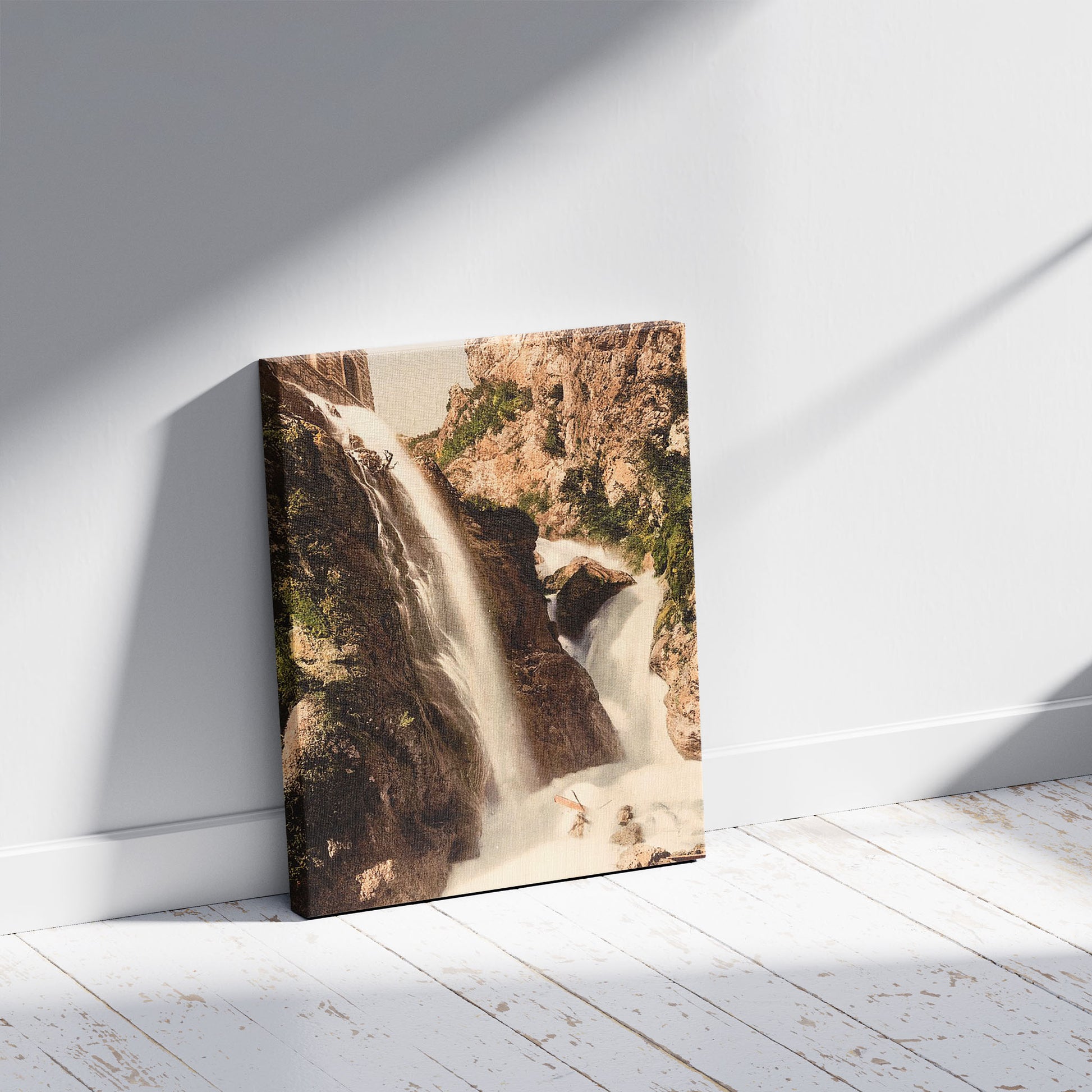 A picture of Ponale Waterfall, Lake Garda, Italy, a mockup of the print leaning against a wall