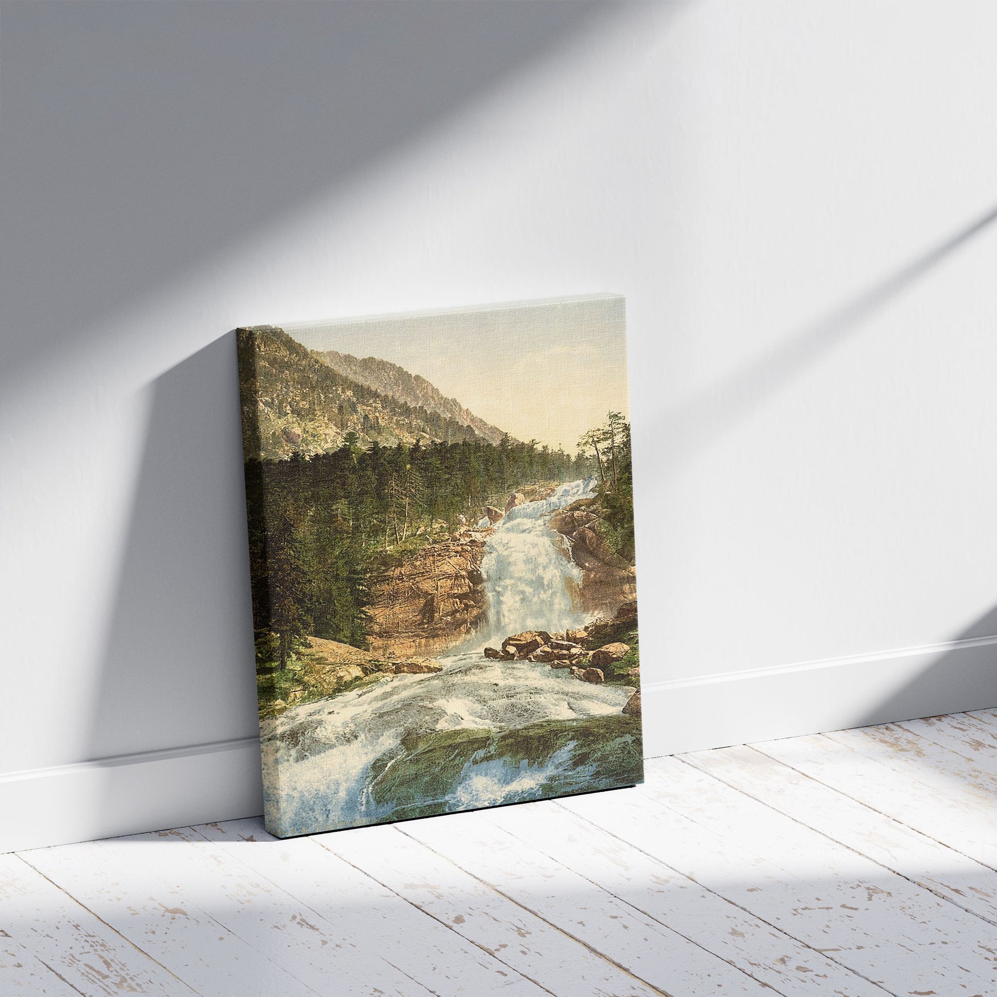 A picture of Pont d'Epagne (i.e., Pont d'Espagne), upper falls, Cauterets, Pyrenees, France, a mockup of the print leaning against a wall