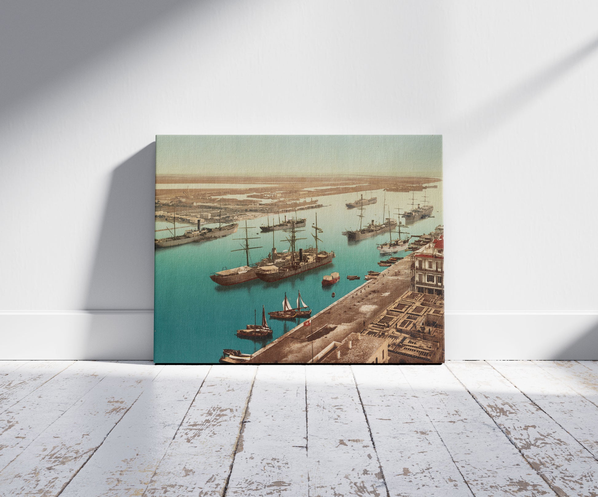 A picture of Port Said, le port, a mockup of the print leaning against a wall