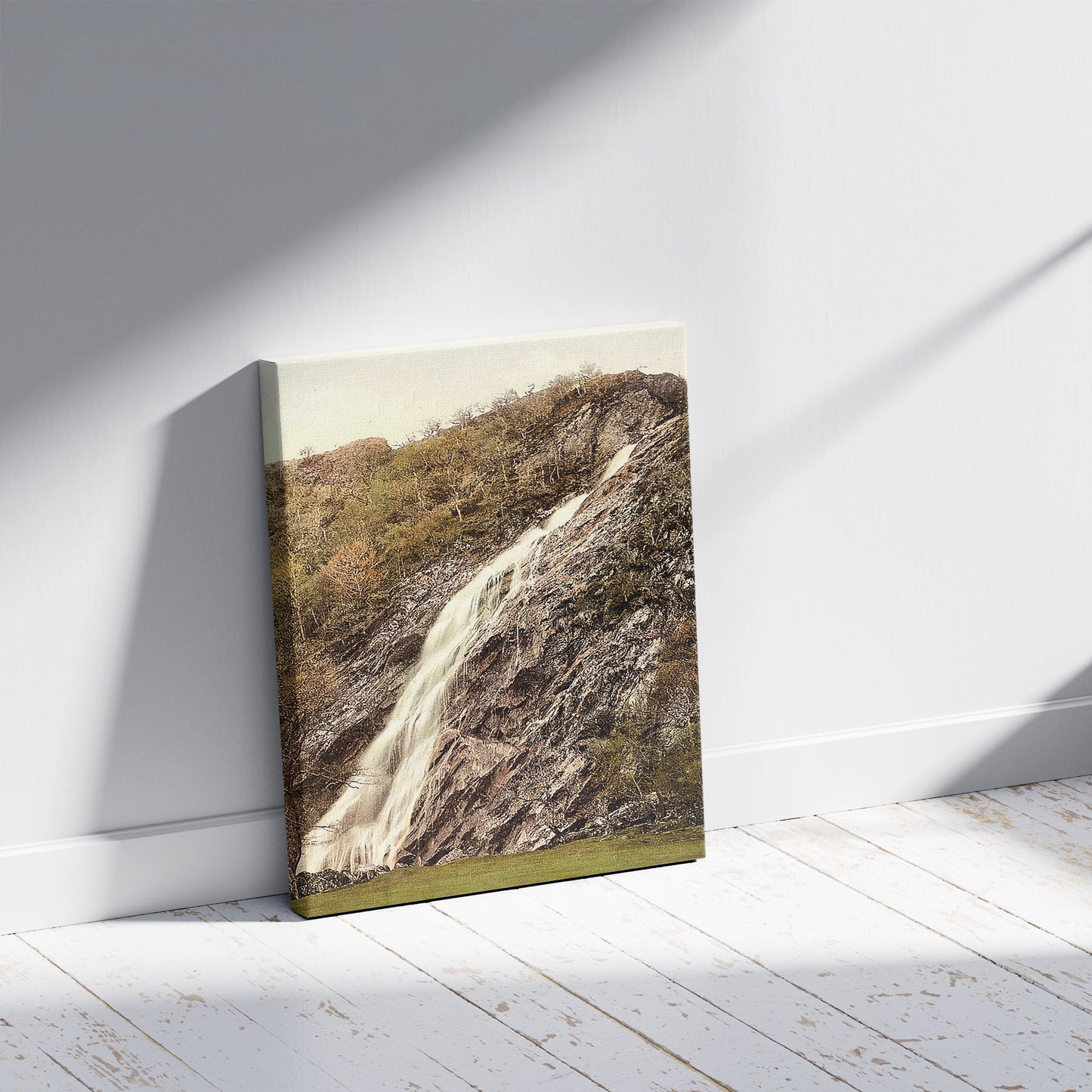 A picture of Powerscourt Waterfall. County Wicklow, Ireland, a mockup of the print leaning against a wall