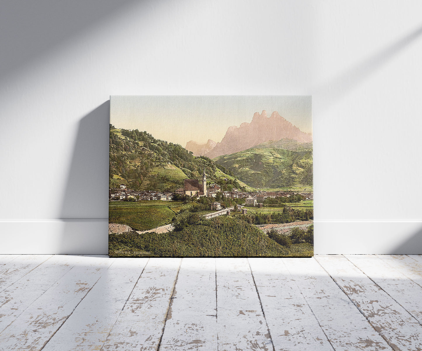 A picture of Primiero, Tyrol, Austro-Hungary, a mockup of the print leaning against a wall