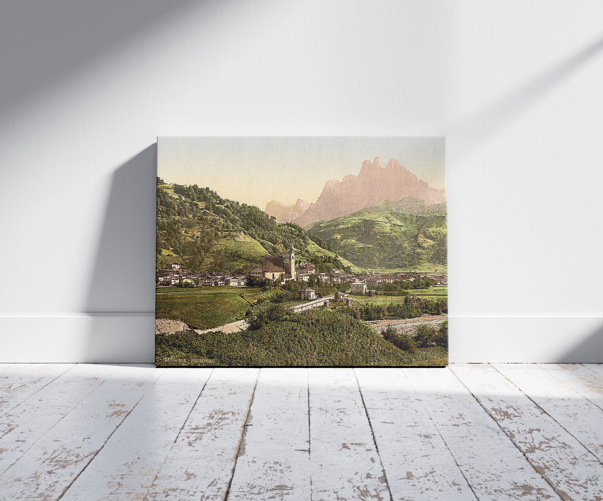A picture of Primiero, Tyrol, Austro-Hungary, a mockup of the print leaning against a wall
