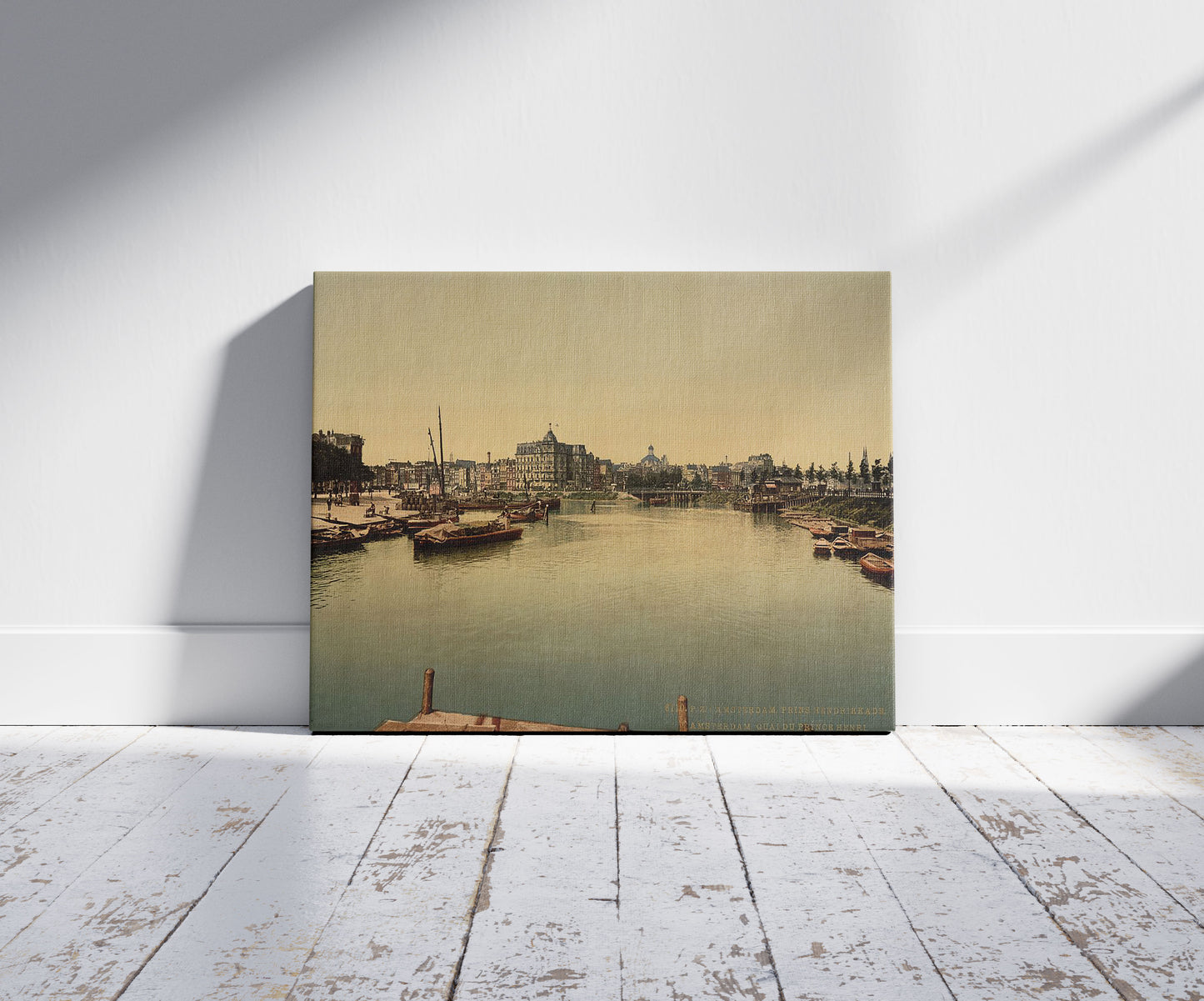 A picture of Prince Henry's quay, Amsterdam, Holland, a mockup of the print leaning against a wall