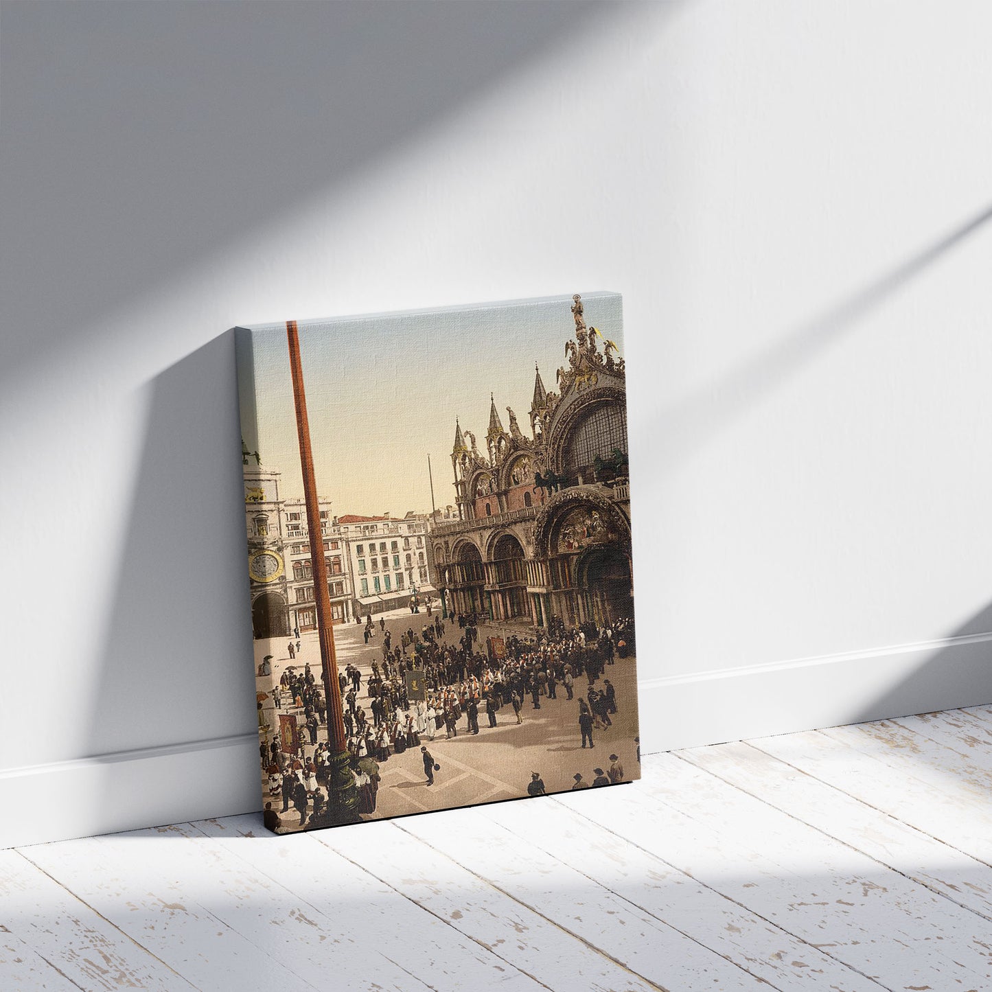 A picture of Procession in front of St. Mark's, Venice, Italy, a mockup of the print leaning against a wall