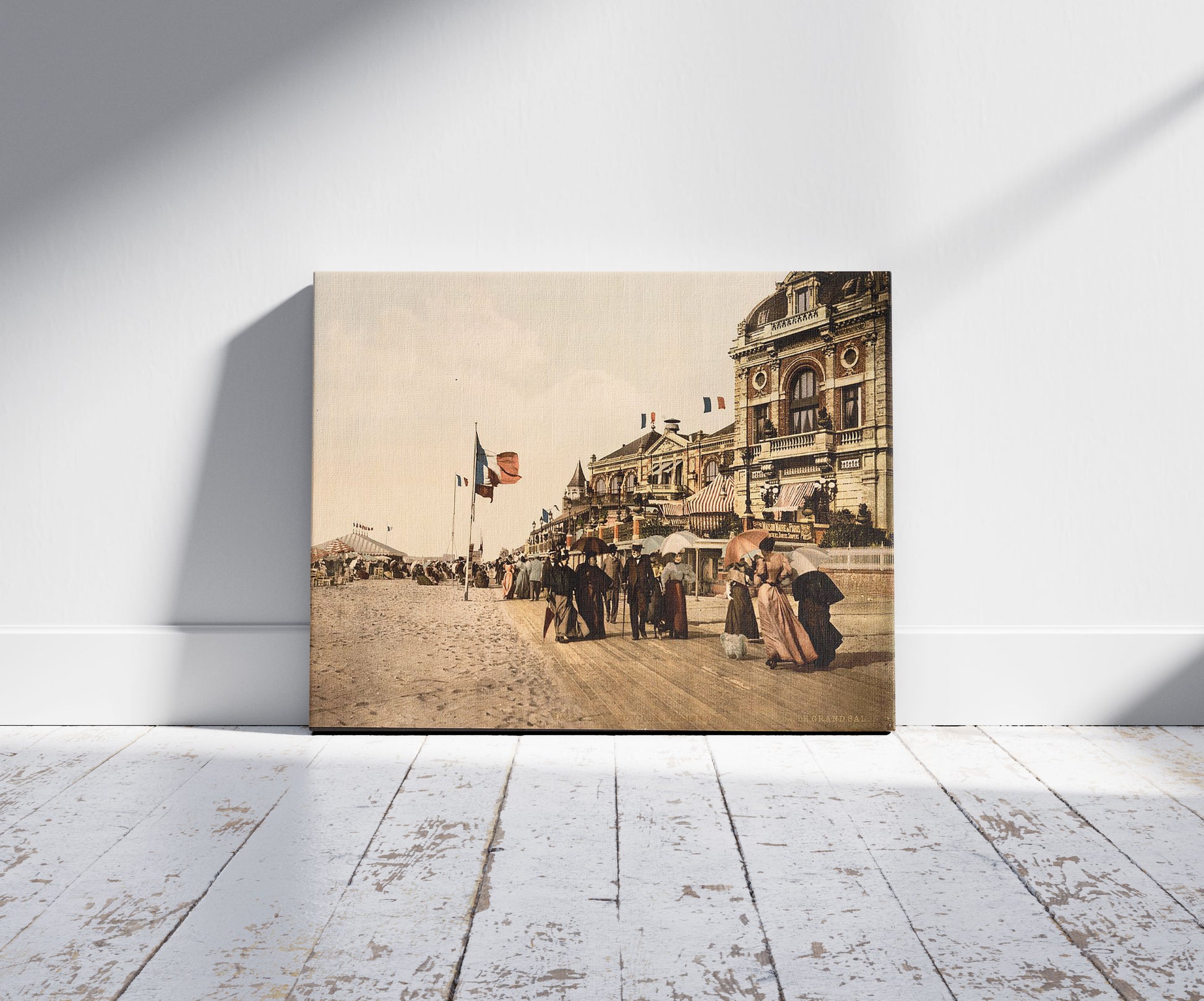 A picture of Promenade and grand Salon, Trouville, France, a mockup of the print leaning against a wall