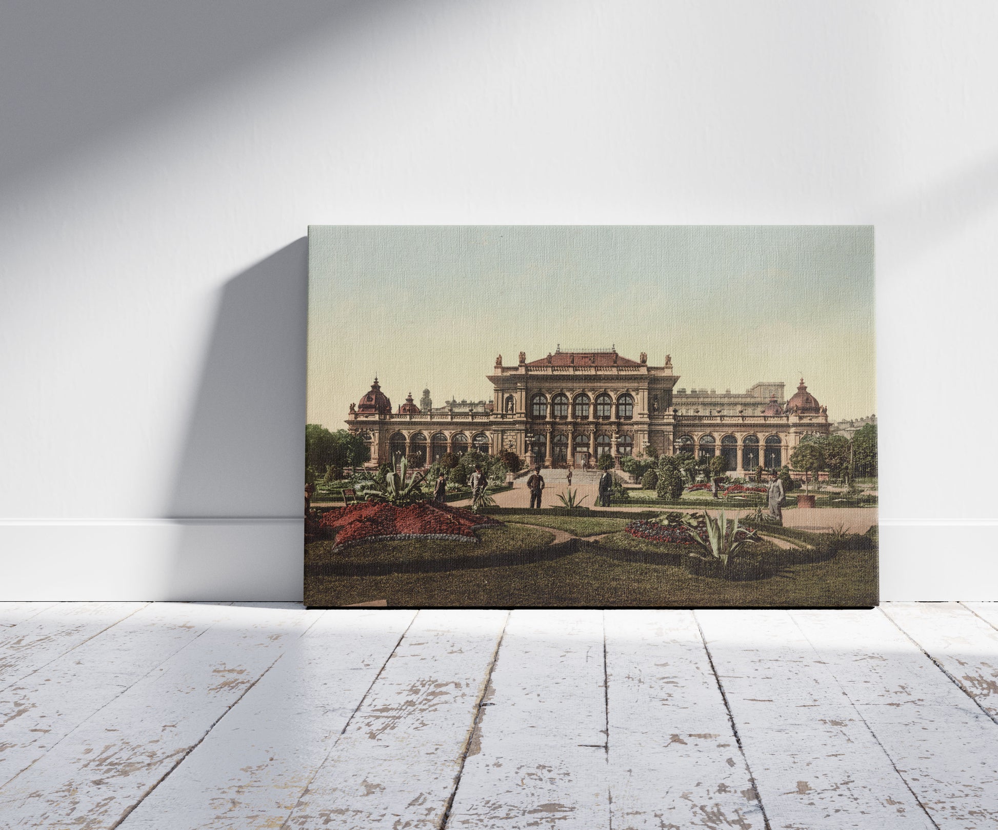 A picture of Public Gardens & Casino, a mockup of the print leaning against a wall