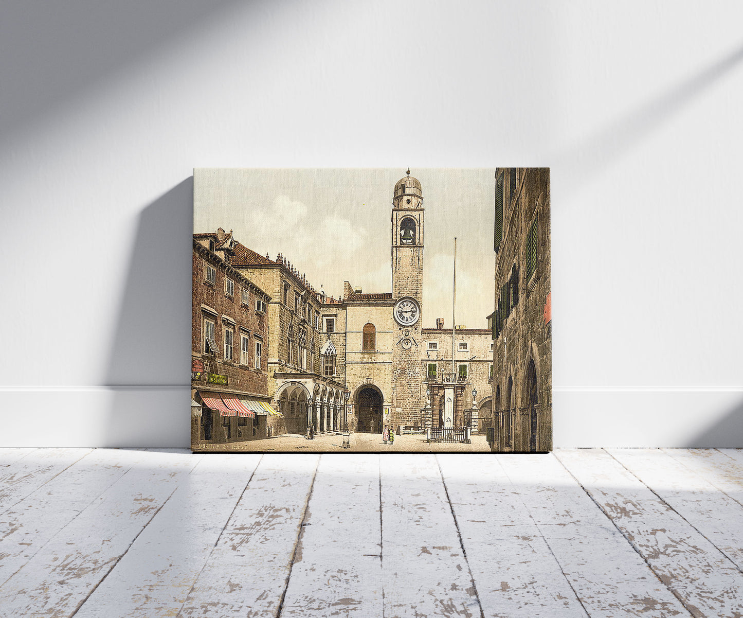 A picture of Ragusa, Corpi di Guardi Square, Dalmatia, Austro-Hungary, a mockup of the print leaning against a wall
