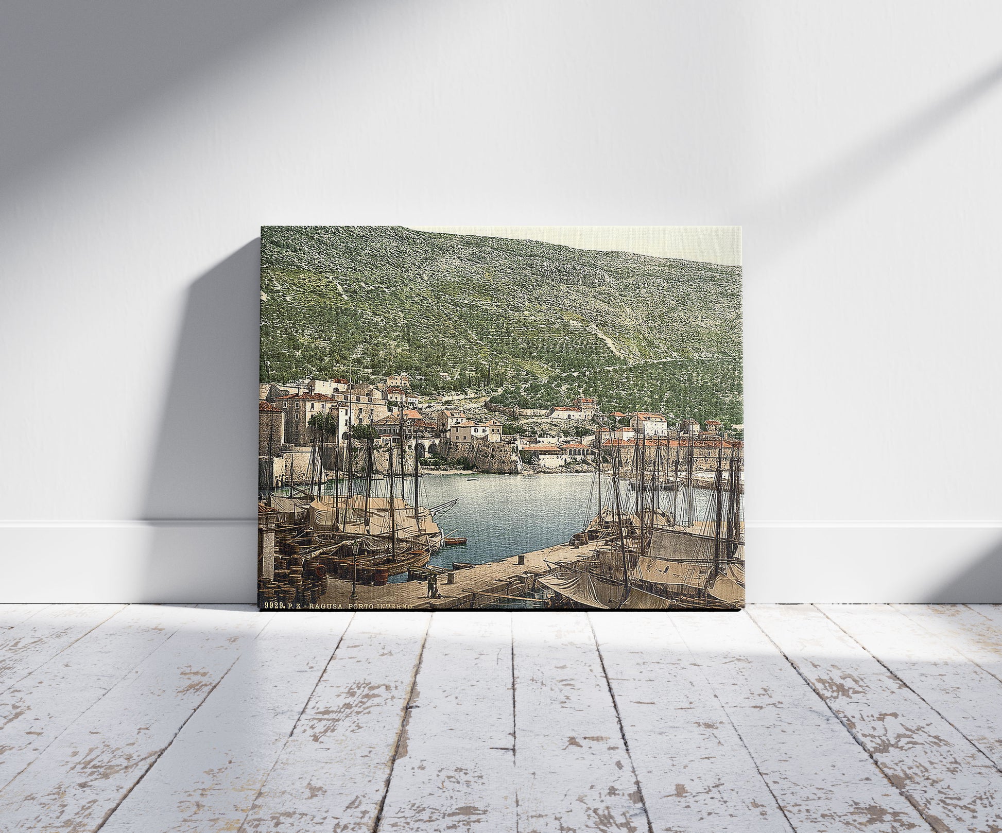 A picture of Ragusa, the Inner Gate, Dalmatia, Austro-Hungary, a mockup of the print leaning against a wall