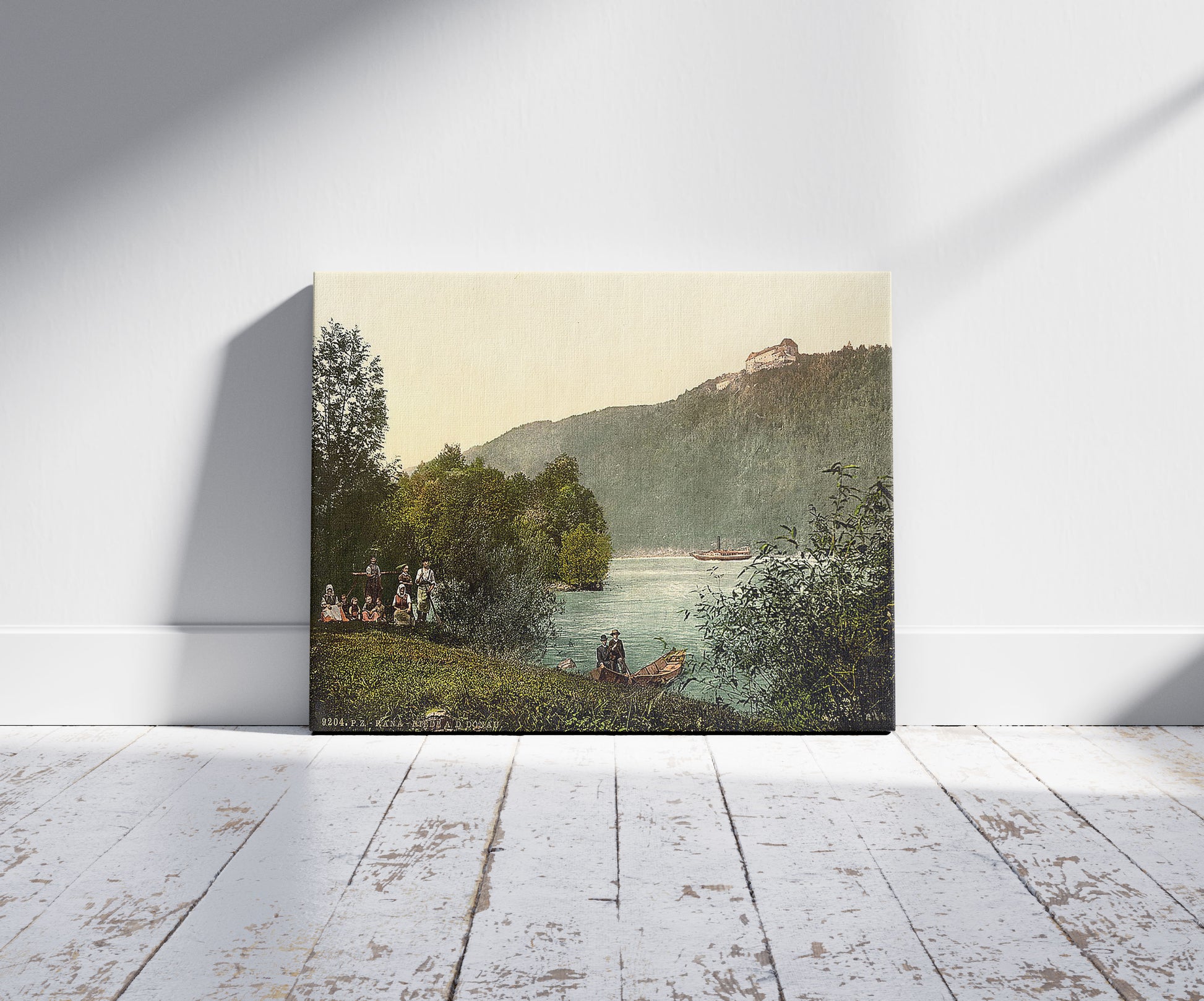 A picture of Rana Riedl, Upper Austria, Austro-Hungary, a mockup of the print leaning against a wall