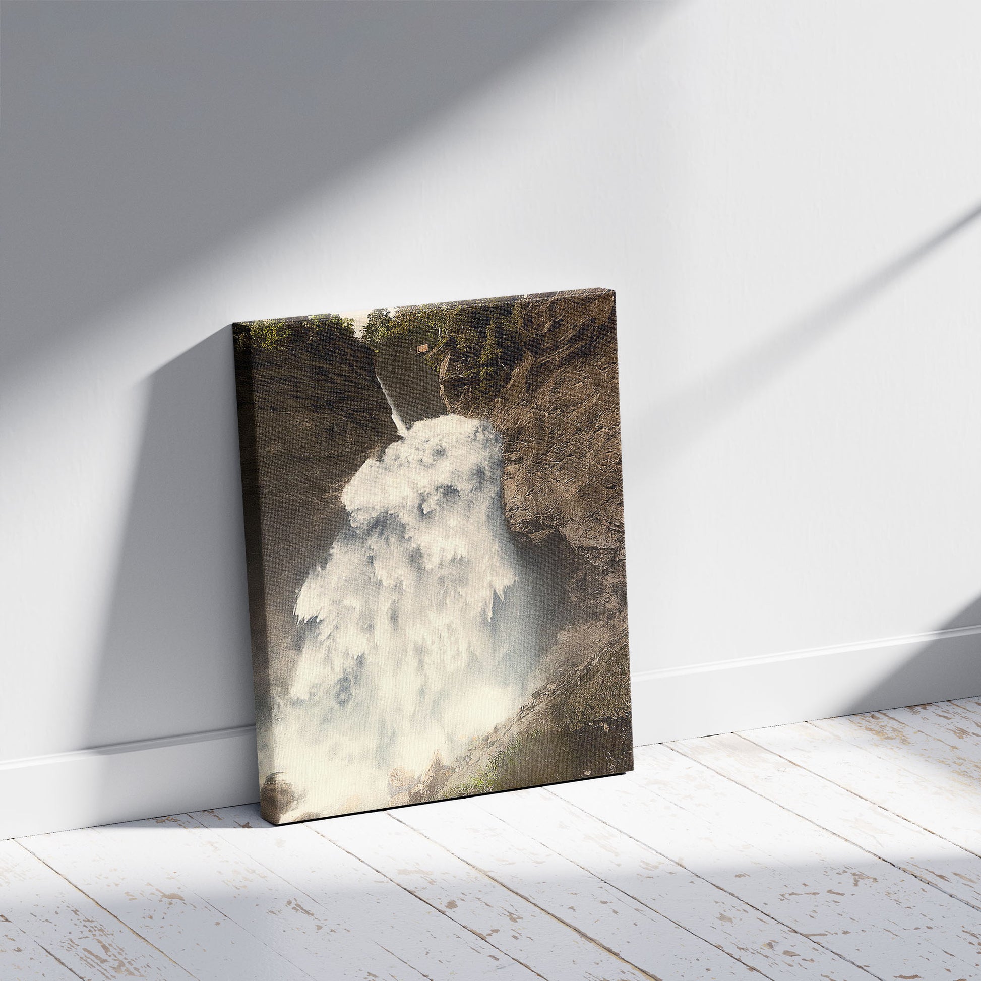 A picture of Reichenbach, the Upper Falls, Bernese Oberland, Switzerland, a mockup of the print leaning against a wall
