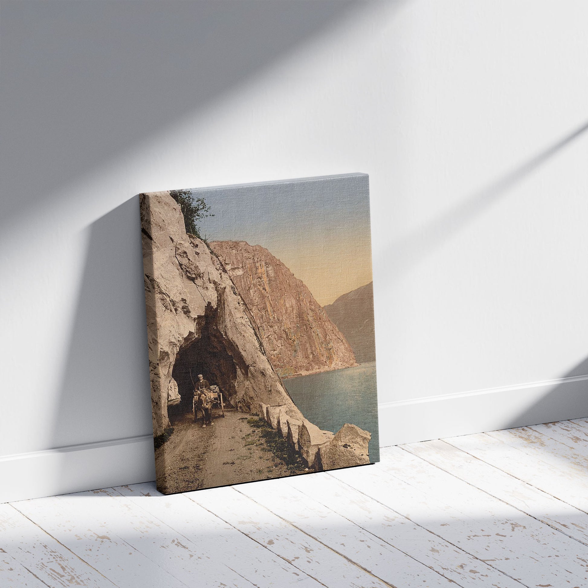 A picture of Road to Vorinfos (i.e., Vøringsfoss)  Hardanger Fjord, Norway, a mockup of the print leaning against a wall