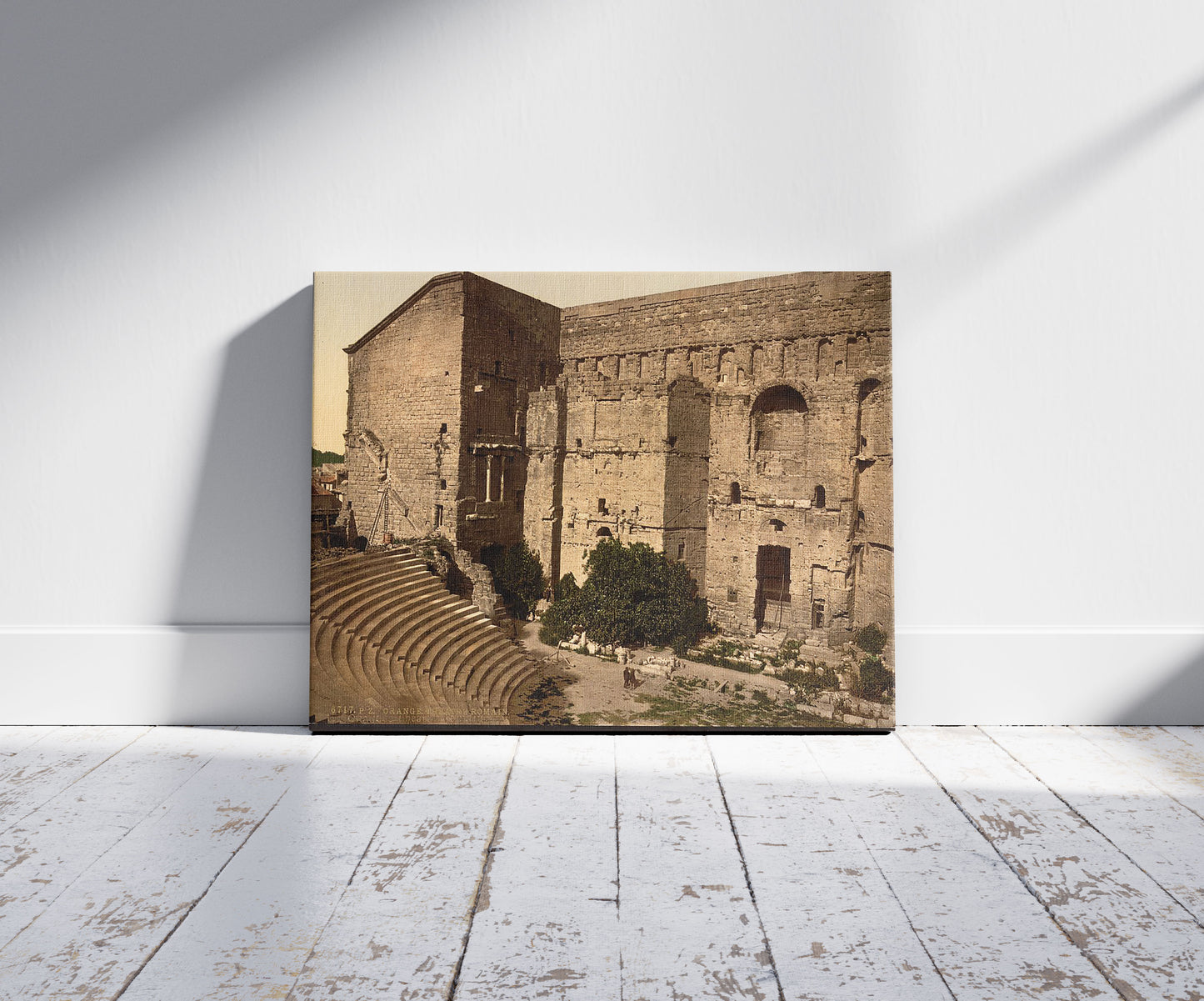 A picture of Roman theatre, Orange, Provence, France, a mockup of the print leaning against a wall