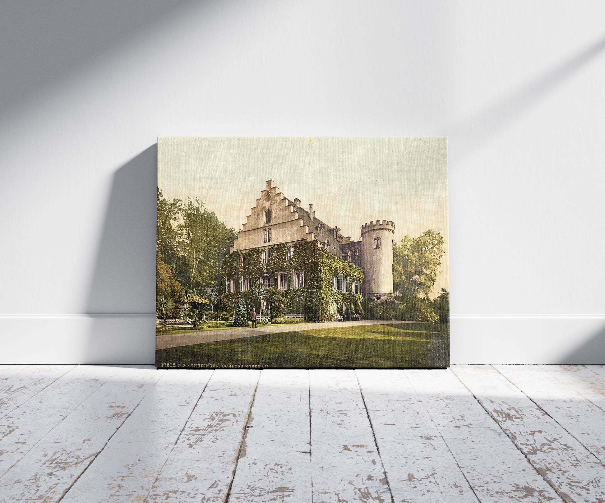 A picture of Rosenau Castle, Thuringia, Germany, a mockup of the print leaning against a wall