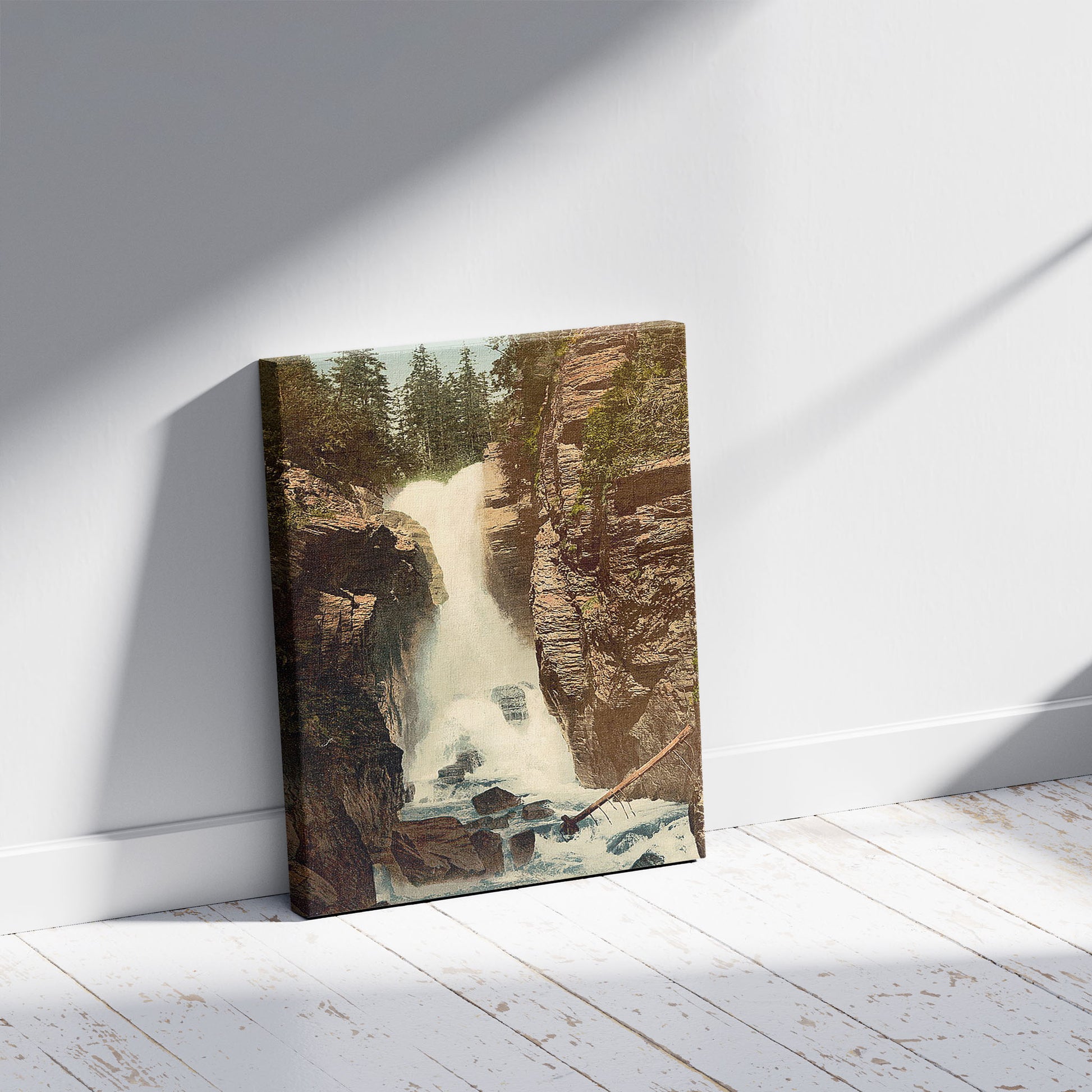 A picture of Rosenlaui, waterfall, Bernese Oberland, Switzerland, a mockup of the print leaning against a wall