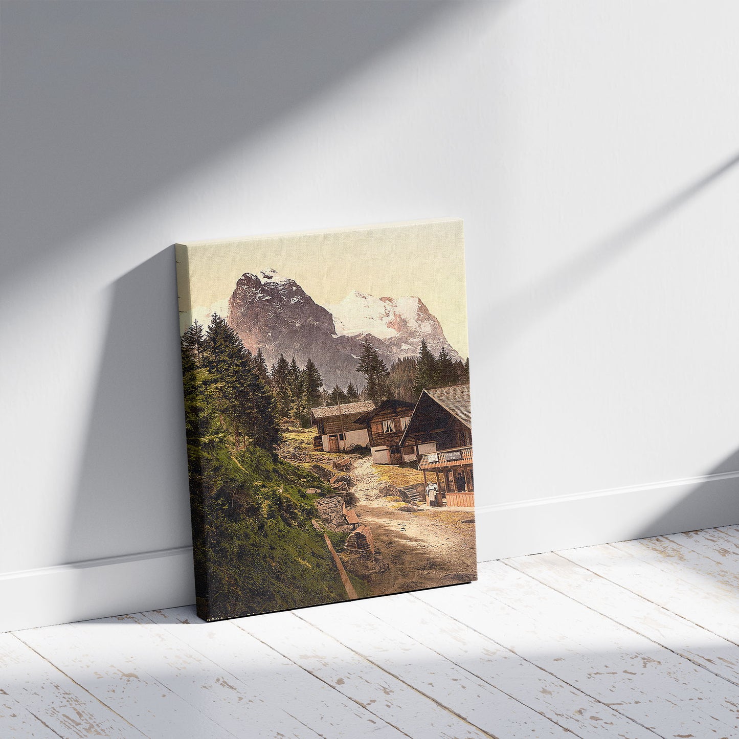 A picture of Rosenlaui, with sawmill, Bernese Oberland, Switzerland, a mockup of the print leaning against a wall