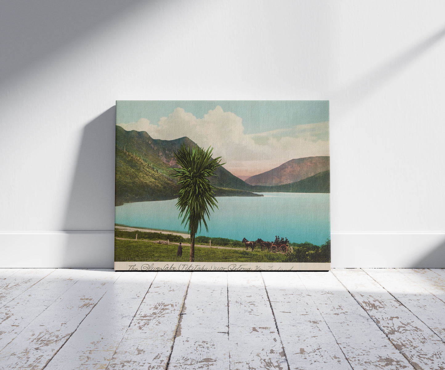 A picture of Rotorua, The Blue Lake (Tikitapu), a mockup of the print leaning against a wall