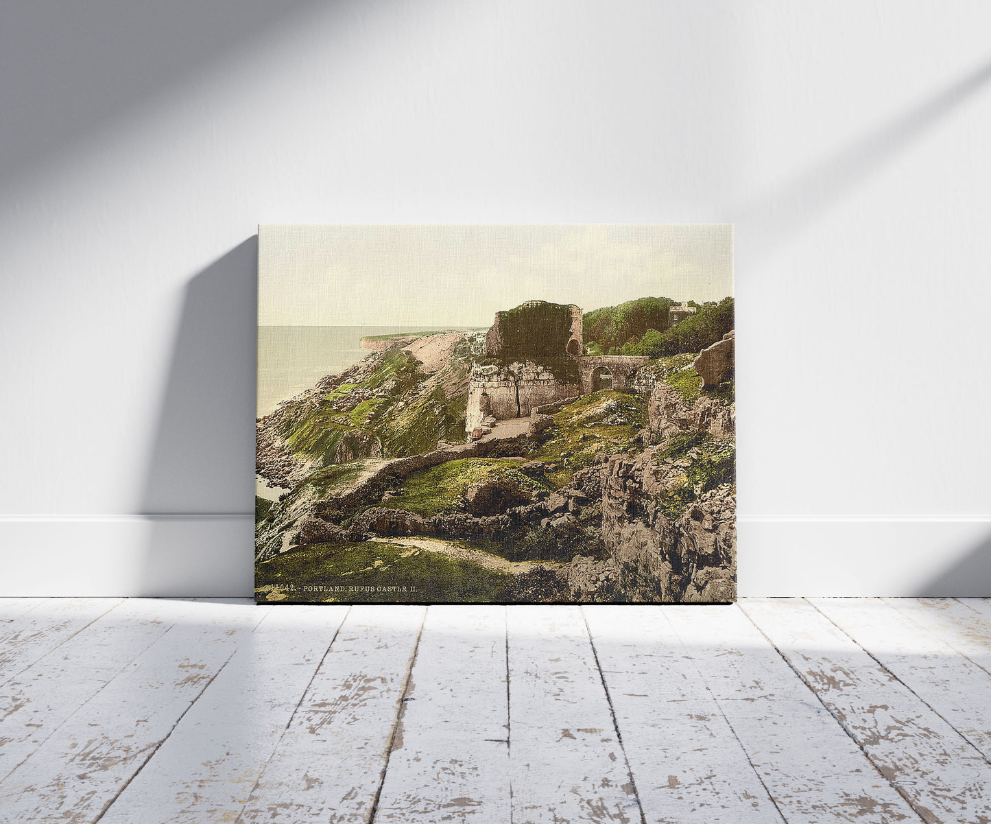 A picture of Rufus Castle, II., Portland, England, a mockup of the print leaning against a wall