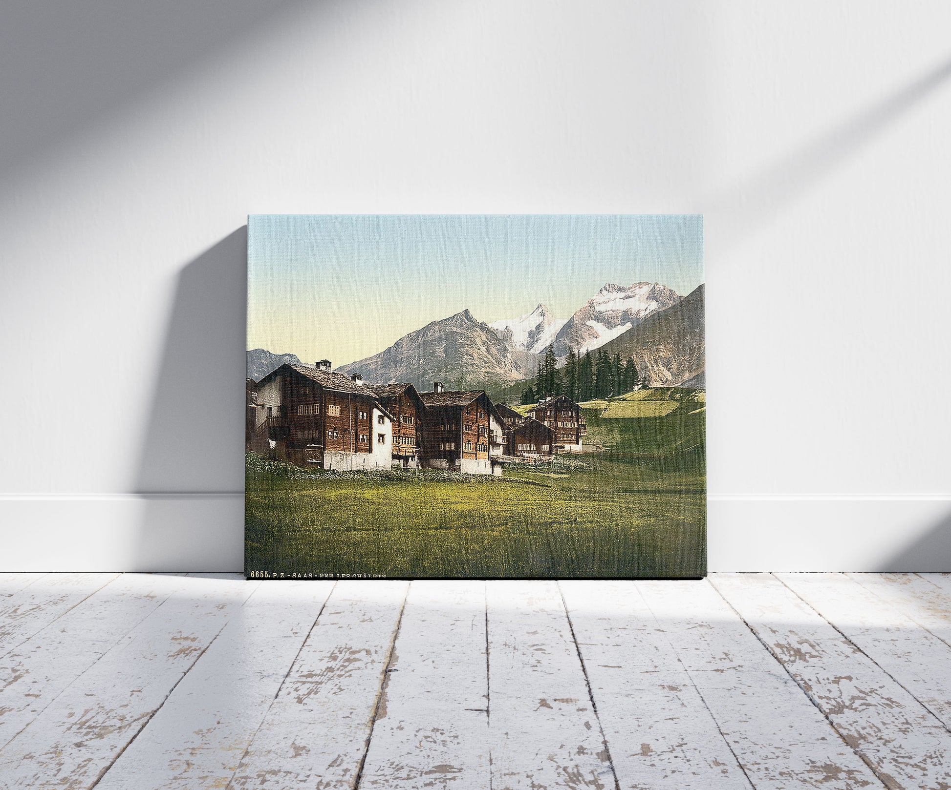 A picture of Saas Fee, Sennhutten, Valais, Alps of, Switzerland, a mockup of the print leaning against a wall