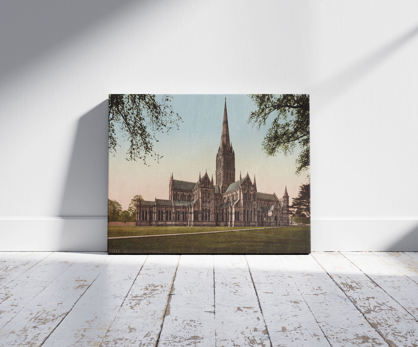 A picture of Salisbury Cathedral, N.E., a mockup of the print leaning against a wall