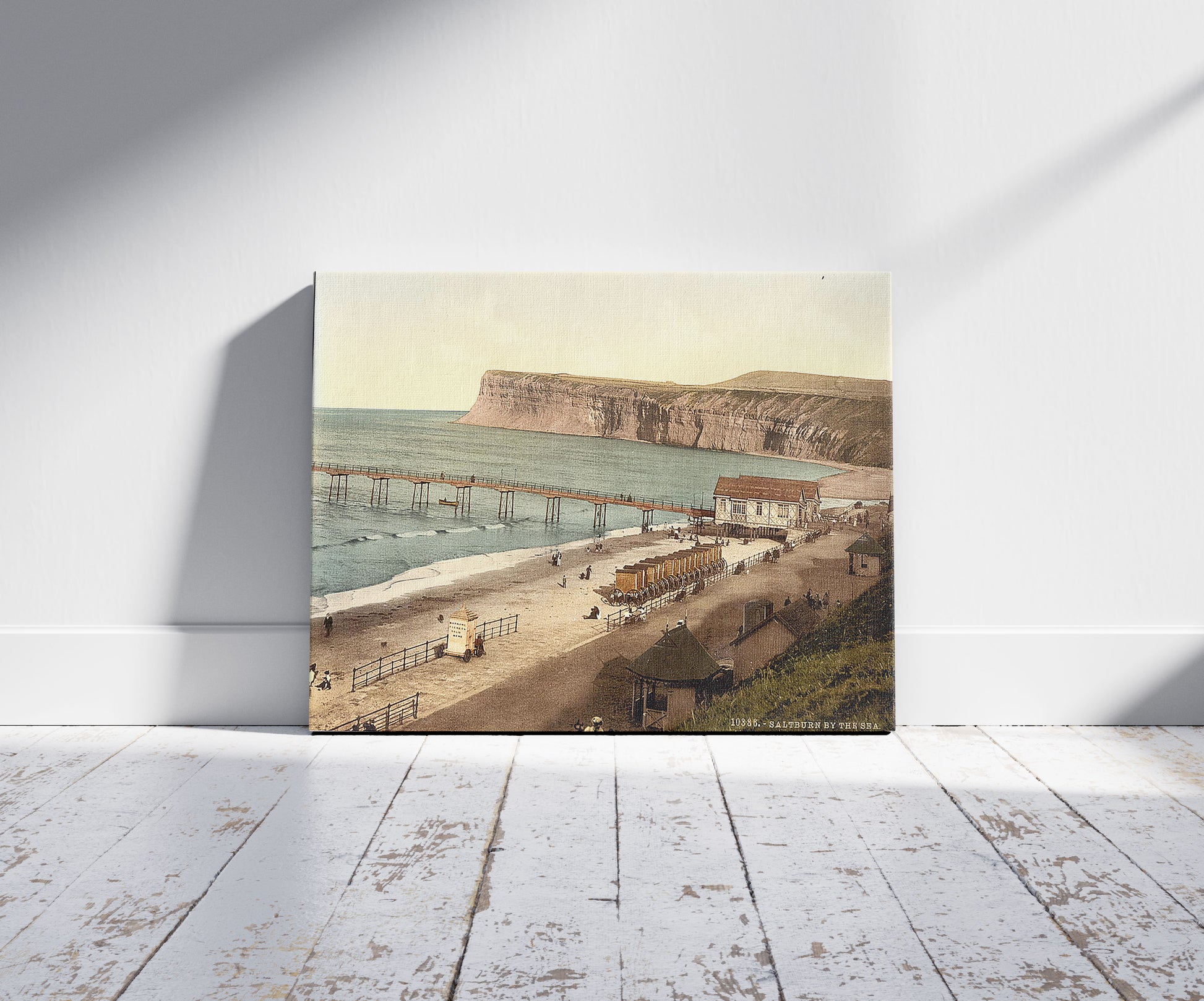 A picture of Saltburn-by-the-Sea, general view, Yorkshire, England, a mockup of the print leaning against a wall