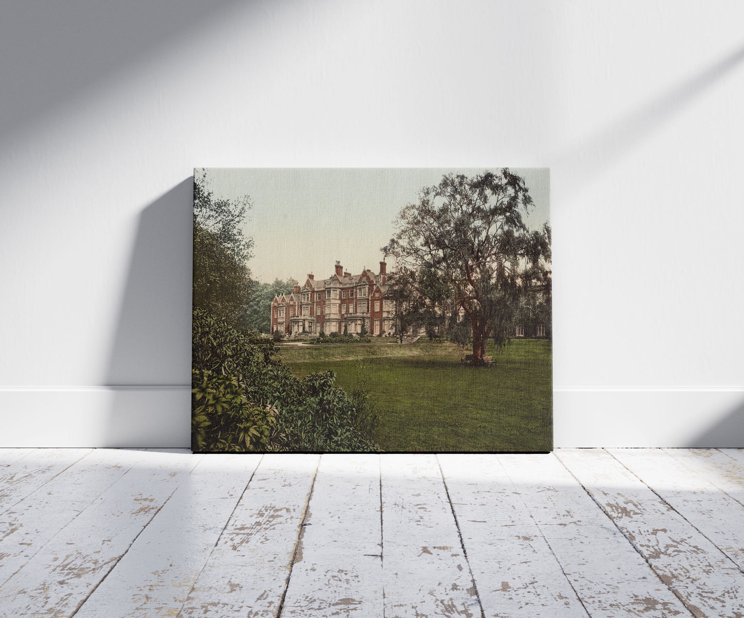 A picture of Sandringham House S.W. Front, a mockup of the print leaning against a wall