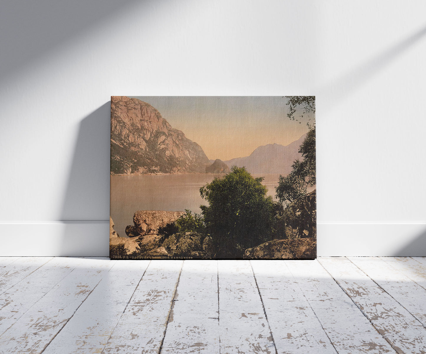 A picture of Sandven Lake, Odde (i.e. Odda), Hardanger Fjord, Norway, a mockup of the print leaning against a wall