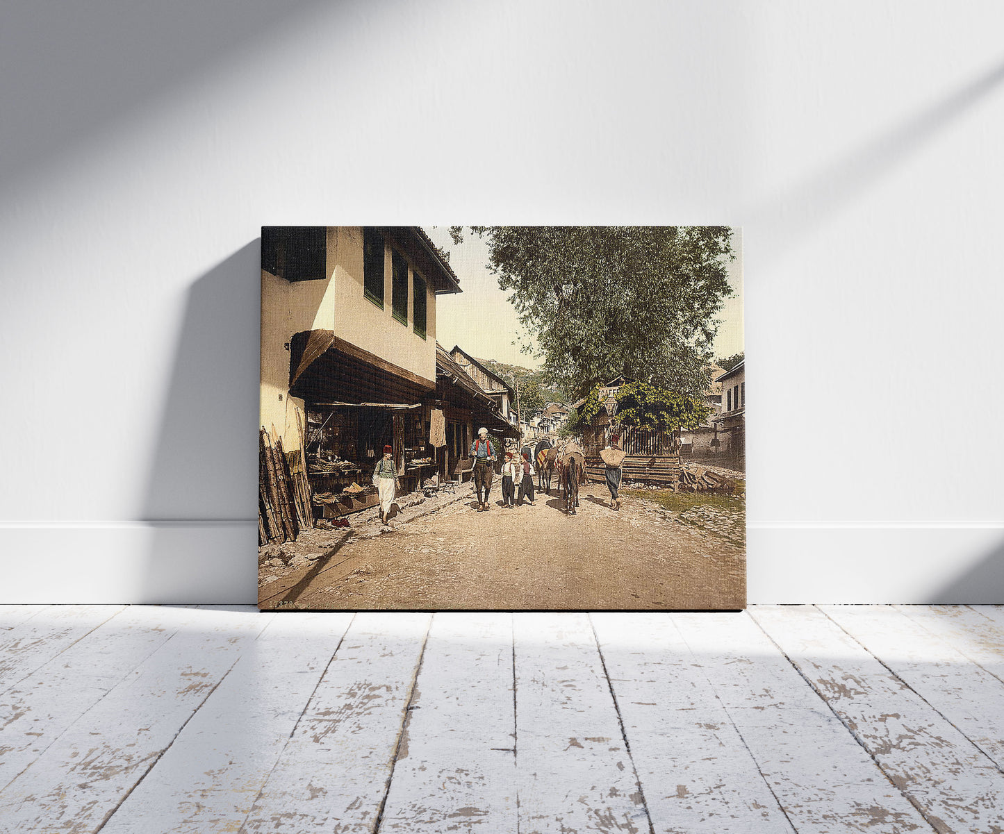 A picture of Sarajcvo (i.e., Sarajevo), Turkenviertal, Bosnia, Austro-Hungary, a mockup of the print leaning against a wall
