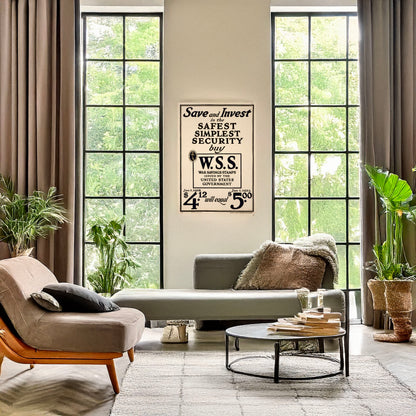 A picture of Save and invest in the safest, simplest security--Buy W.S.S.--War Savings Stamps issued by the United States Government $4.12 Jan. 1, 1918 will equal $5.00 Jan. 1, 1923., a mockup of the print leaning against a wall