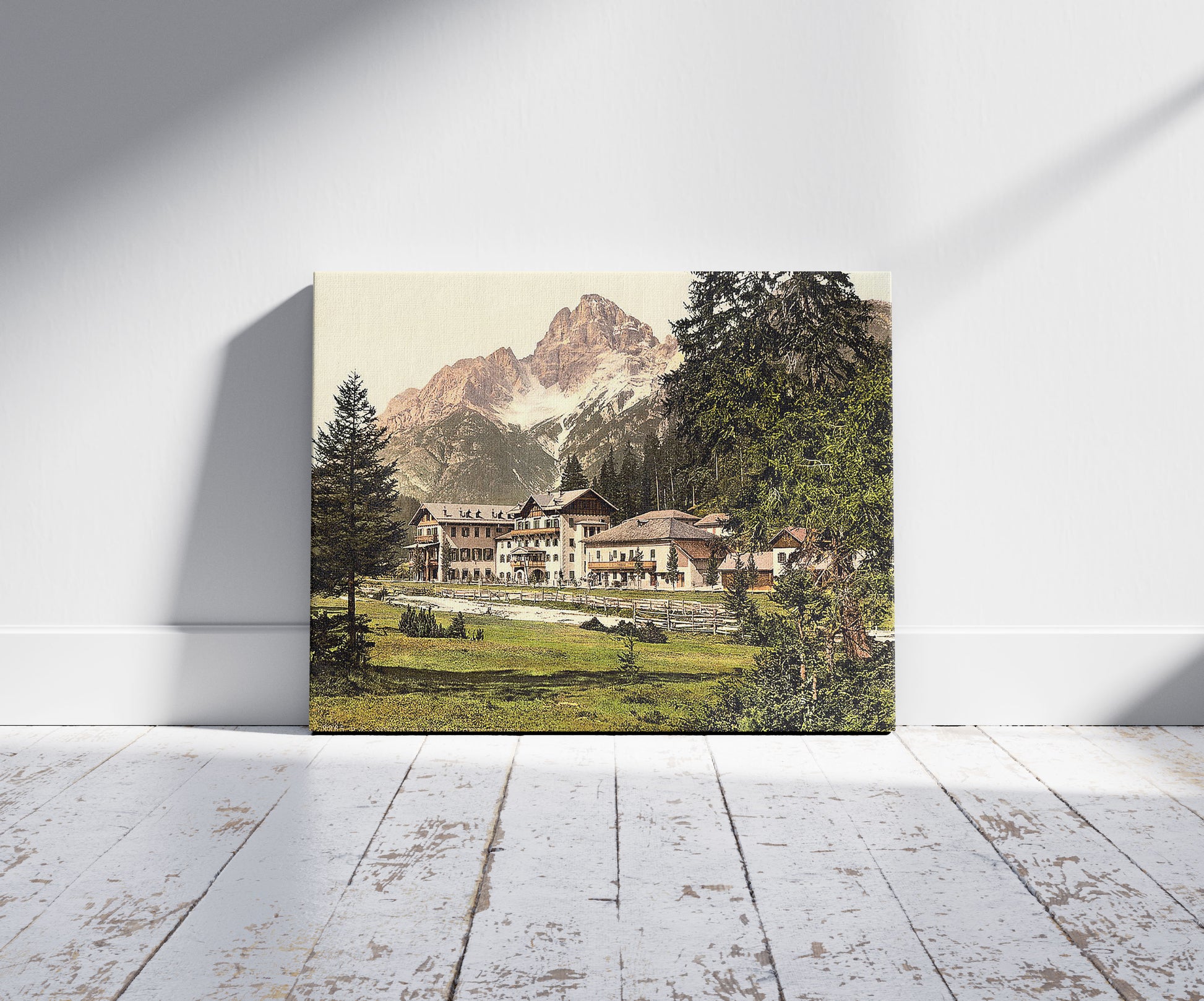 A picture of Schluderbach and Croda Pass (i.e., (Croda Rosa), Tyrol, Austro-Hungary, a mockup of the print leaning against a wall