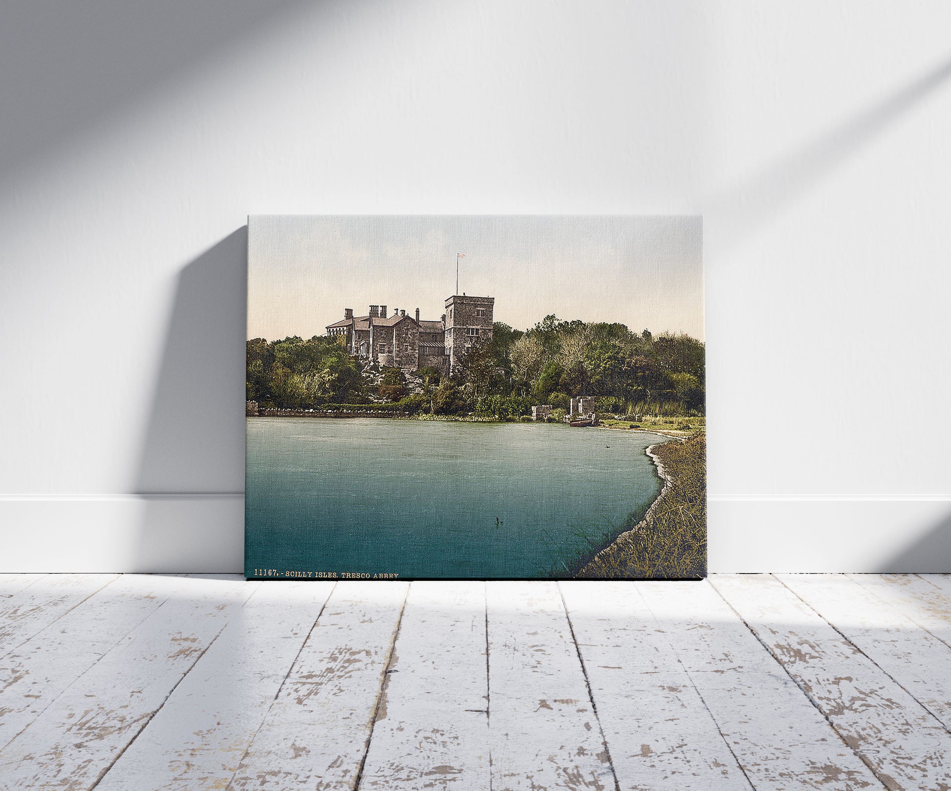 A picture of Scilly Isles, Tresco Abbey, Cornwall, England, a mockup of the print leaning against a wall