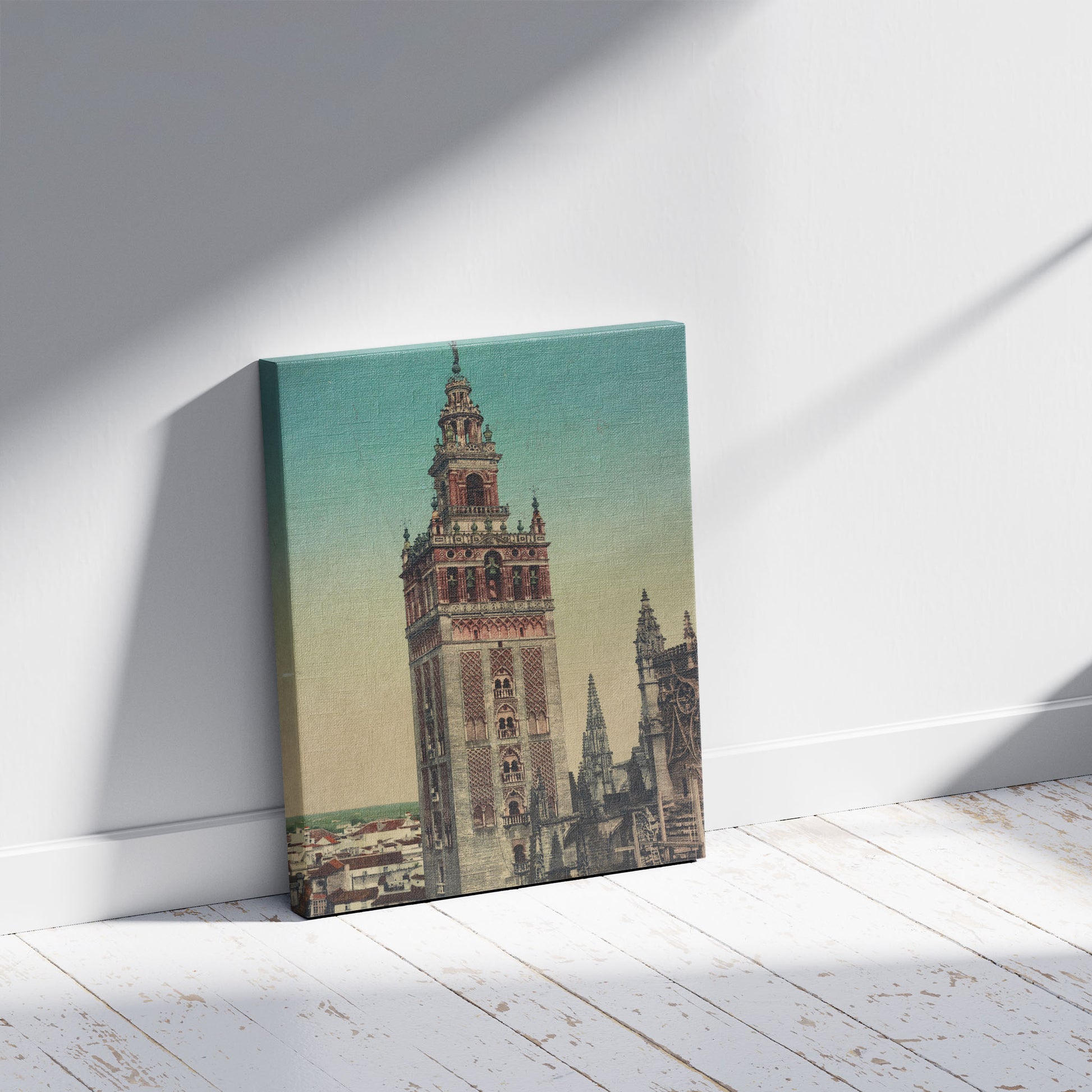 A picture of Sevilla. La Giralda, a mockup of the print leaning against a wall