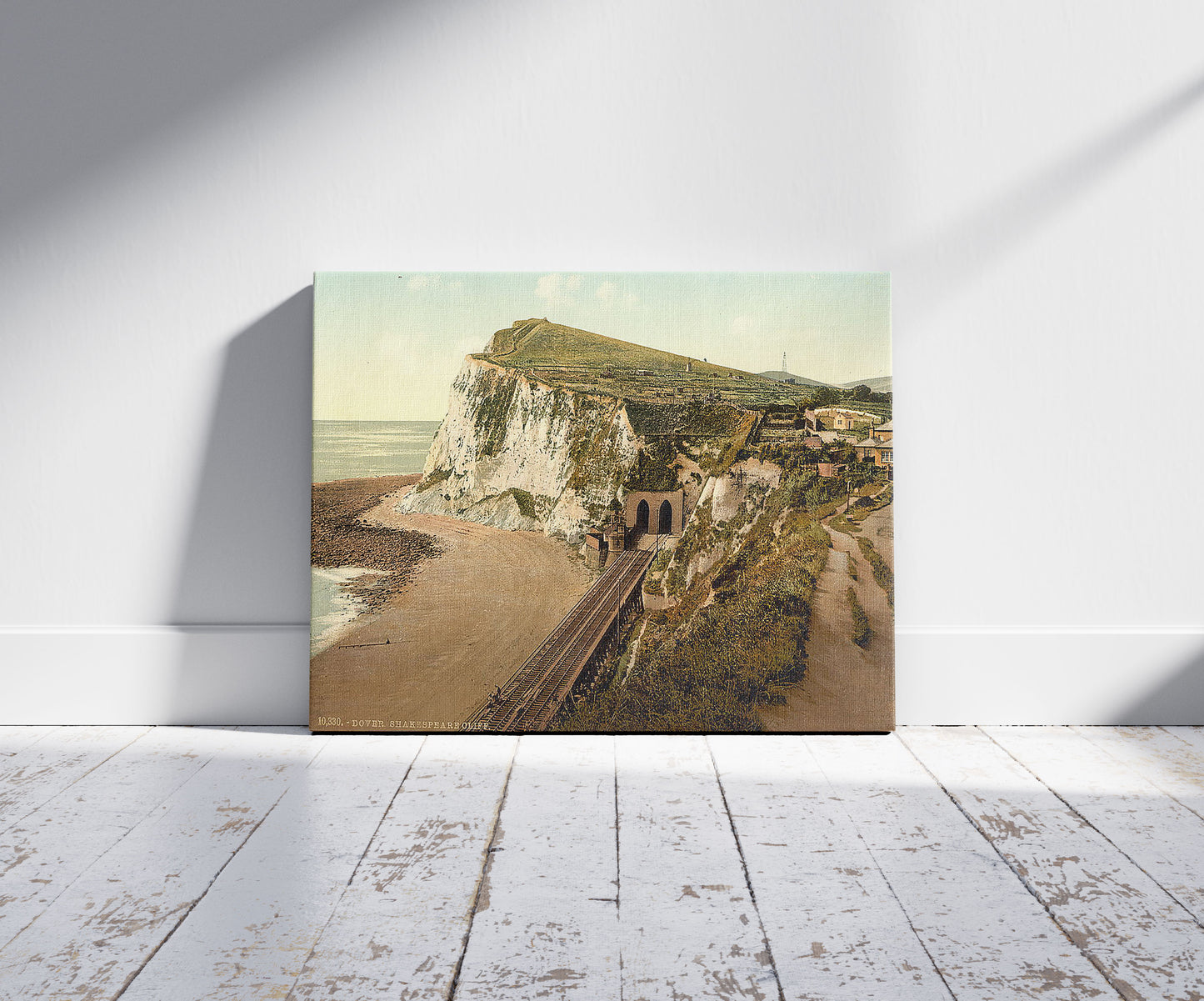 A picture of Shakespeare's Cliff, Dover, England, a mockup of the print leaning against a wall