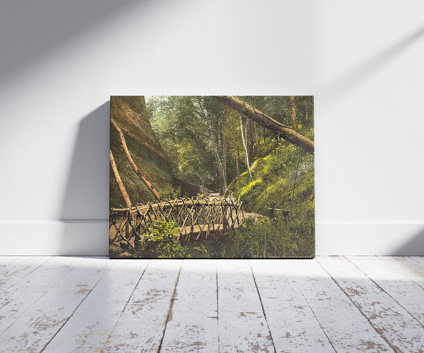 A picture of Shanklin, the bridge, Isle of Wight, England, a mockup of the print leaning against a wall