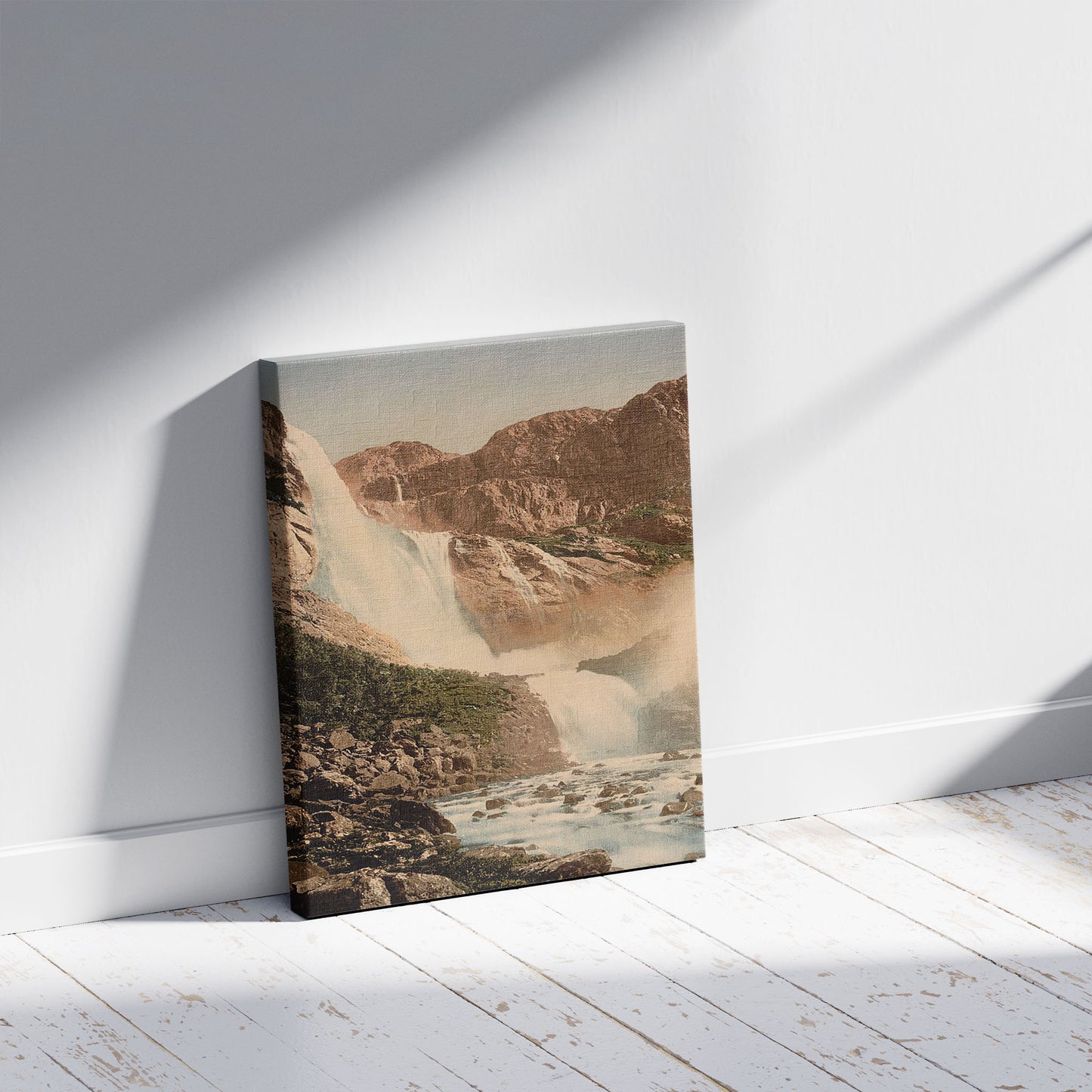 A picture of Skjeggedalsfos, I, Odde (i.e. Odda), Hardanger Fjord, Norway, a mockup of the print leaning against a wall