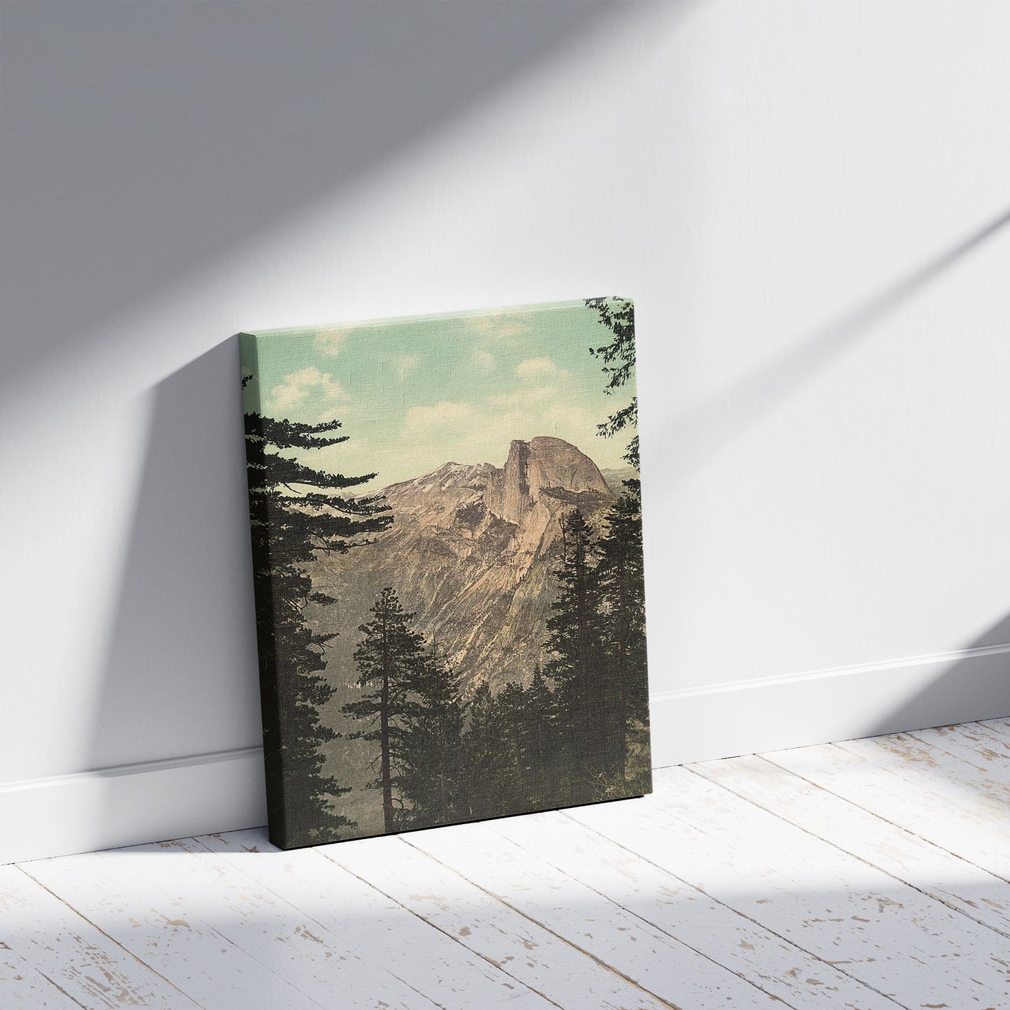 A picture of South Dome, Yosemite Valley, a mockup of the print leaning against a wall