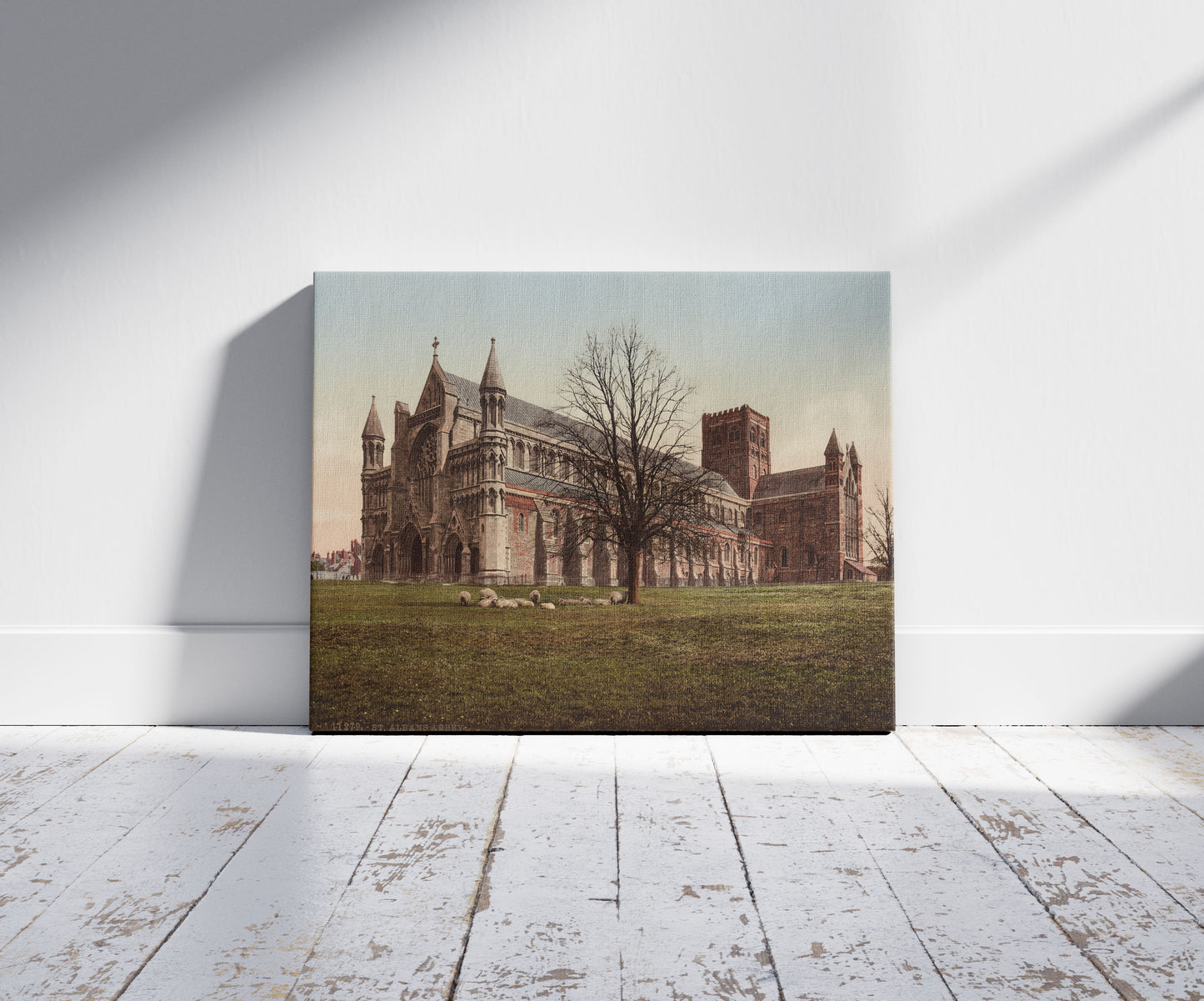 A picture of St. Albans Abbey, a mockup of the print leaning against a wall