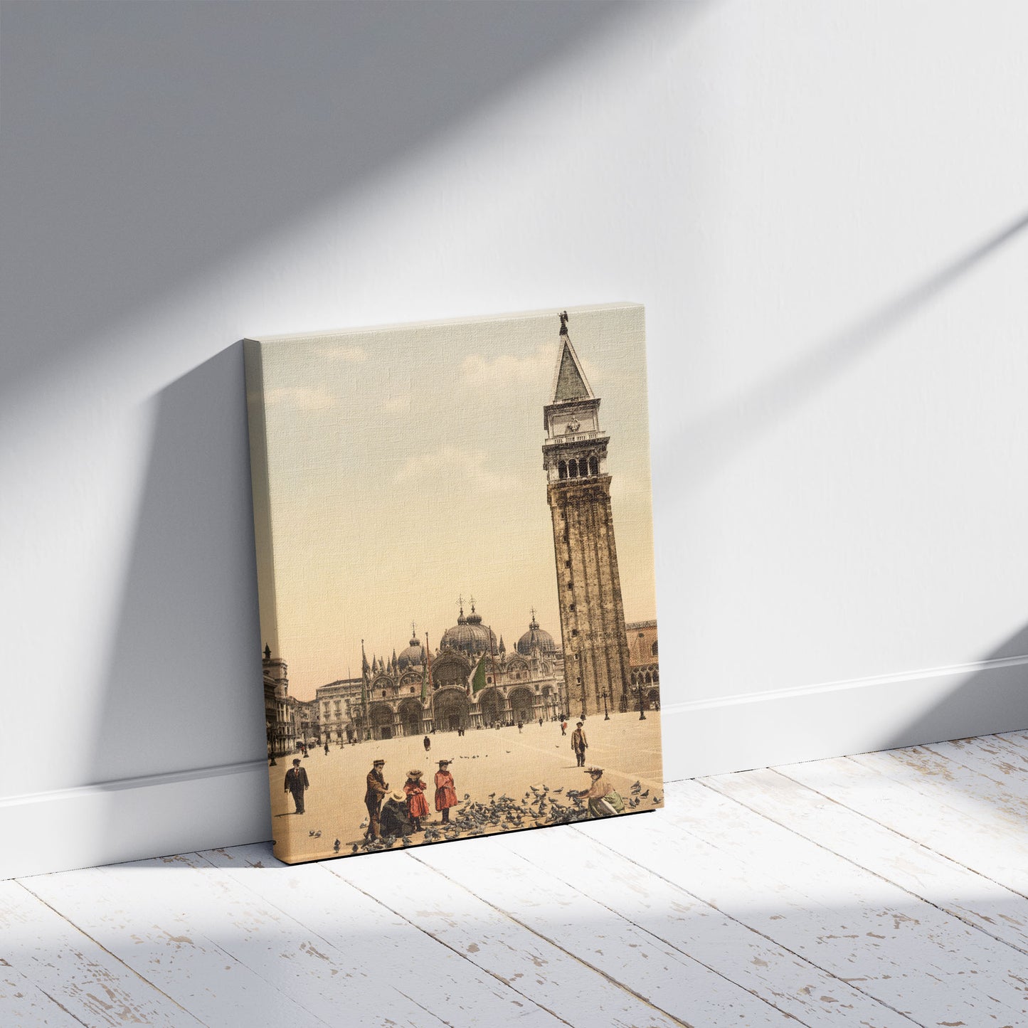 A picture of St. Mark's Place, with campanile, Venice, Italy, a mockup of the print leaning against a wall