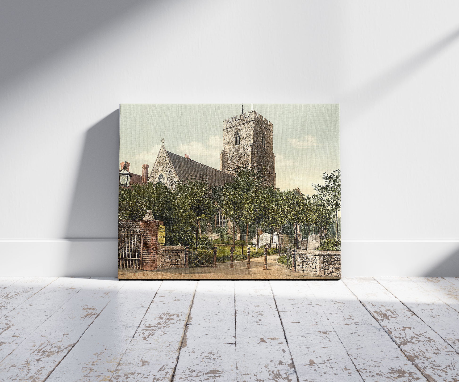 A picture of St. Mary's Church, Folkestone, England, a mockup of the print leaning against a wall