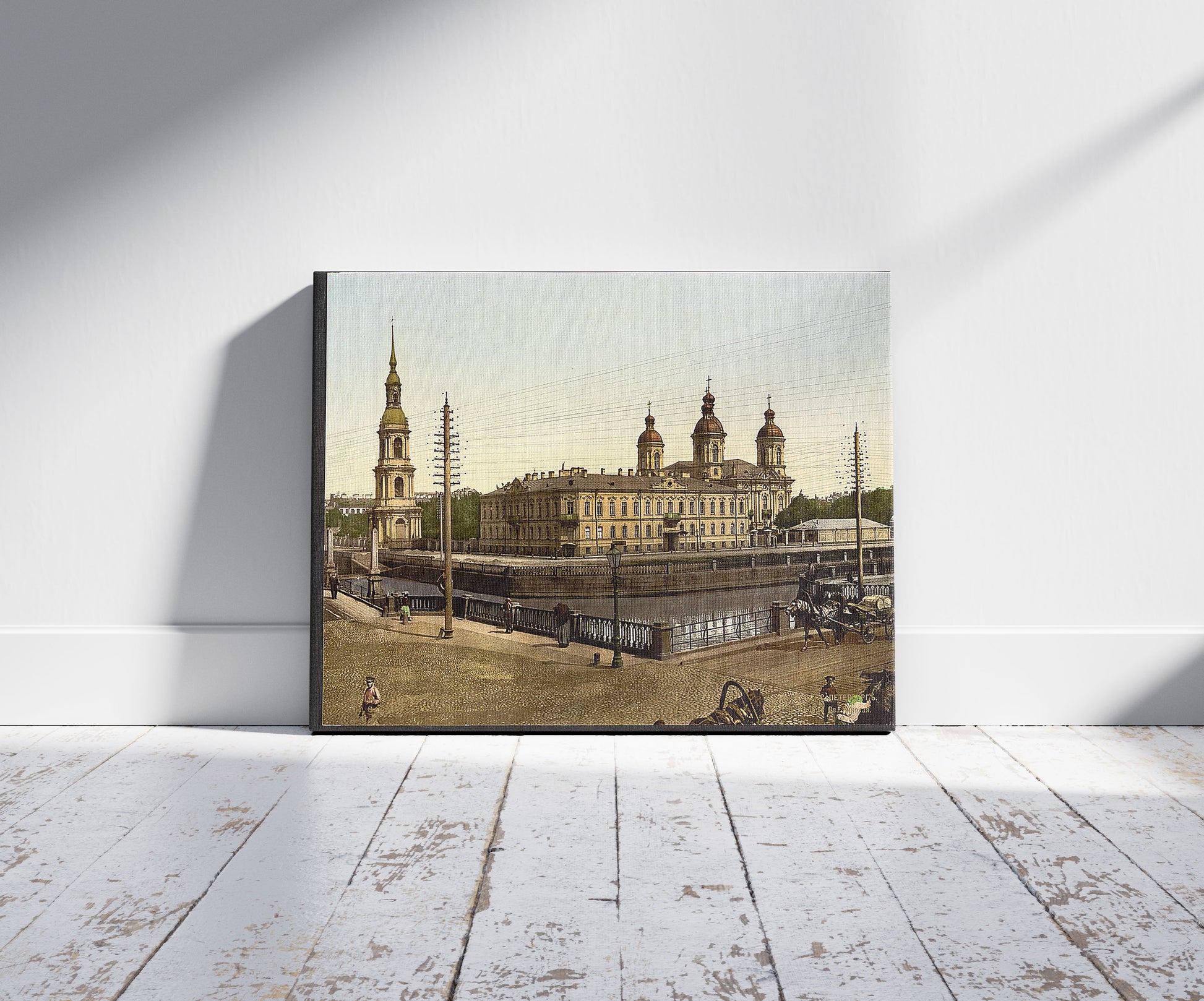 A picture of St. Nicholas Church, St. Petersburg, Russia, a mockup of the print leaning against a wall