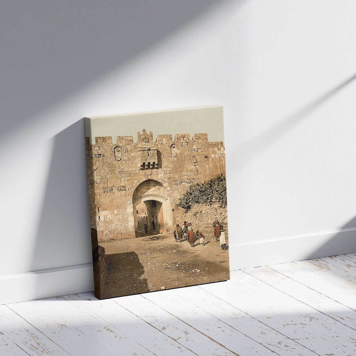 A picture of St. Stephen's Gate, Jerusalem, Holy Land, a mockup of the print leaning against a wall