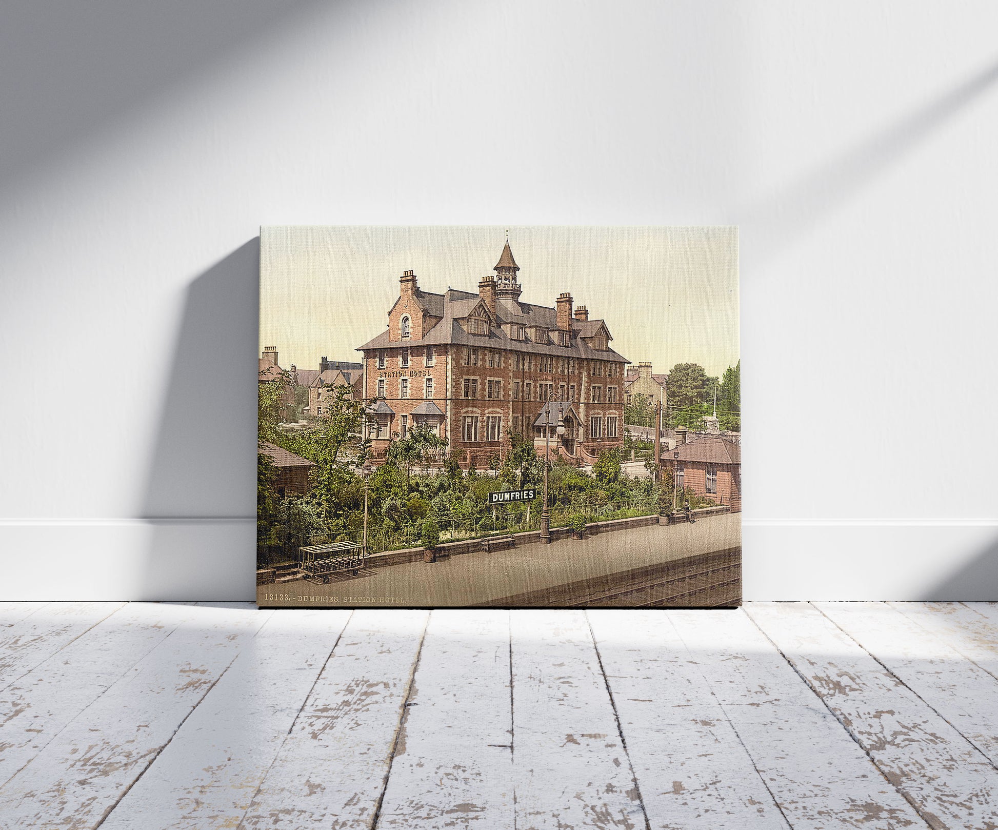 A picture of Station Hotel, Dumfries, Scotland, a mockup of the print leaning against a wall