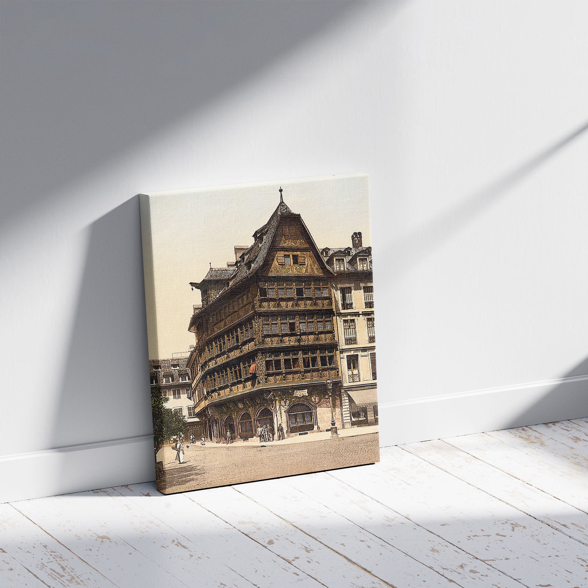 A picture of Strasbourg. Vieille maison Strassburg. Altes Haus., a mockup of the print leaning against a wall