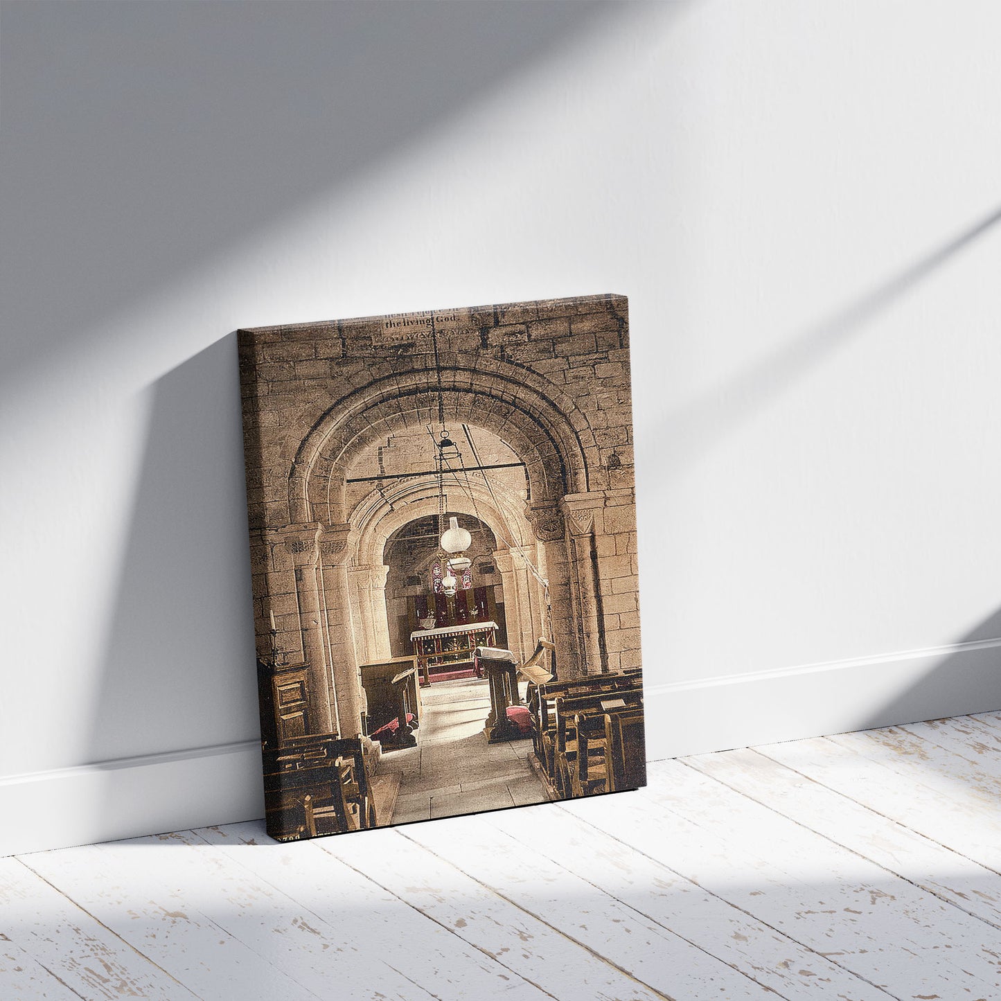 A picture of Studland Church, interior, Swanage i.e. Studland, England, a mockup of the print leaning against a wall