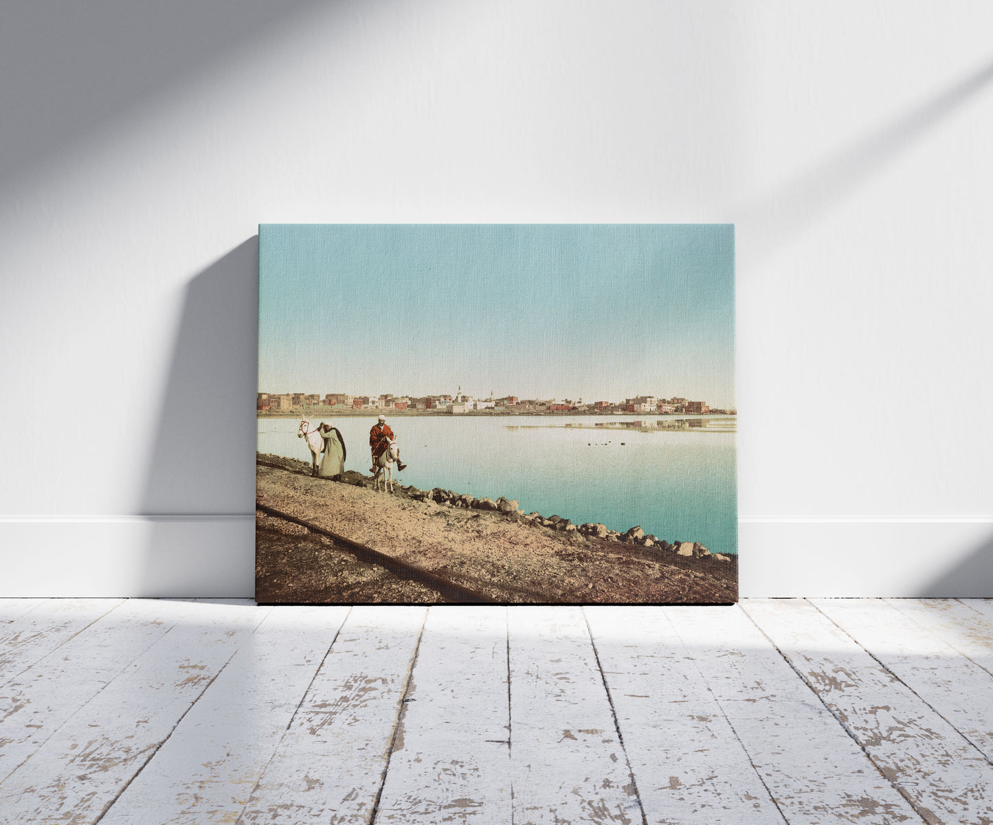 A picture of Suez, depuis le digue, a mockup of the print leaning against a wall